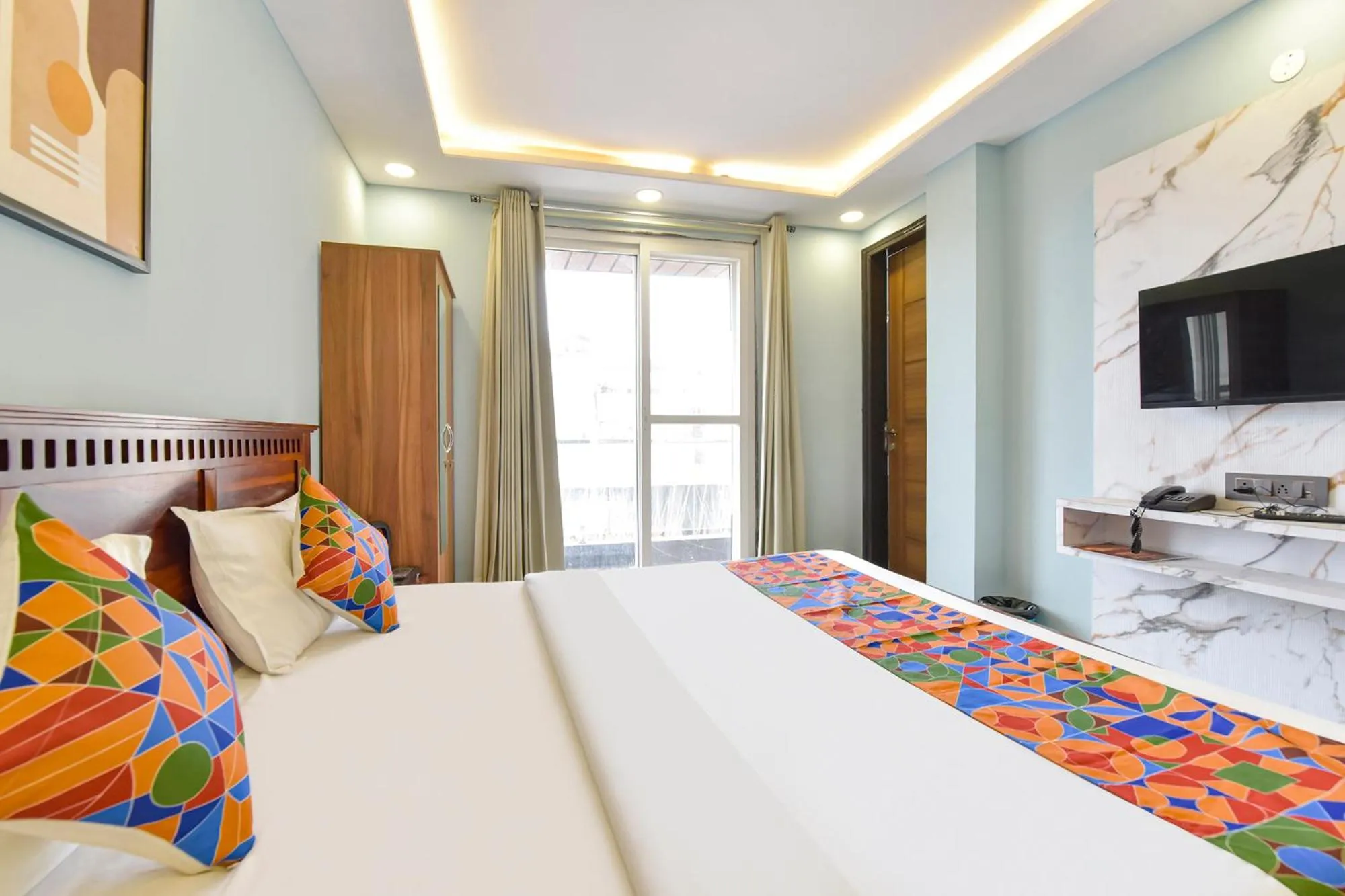 Bed in FabHotel Pink Palace Raja Park