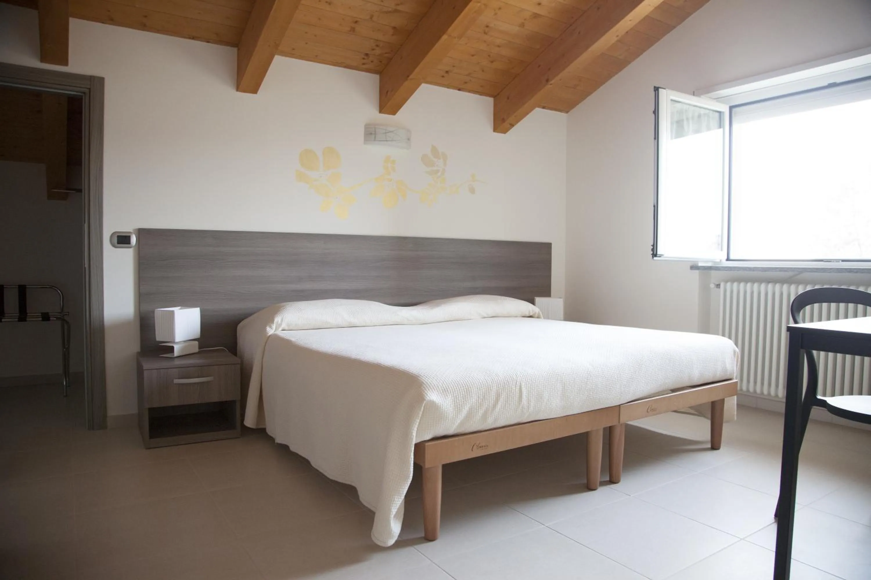 Bed in B&B Alba in Langhe