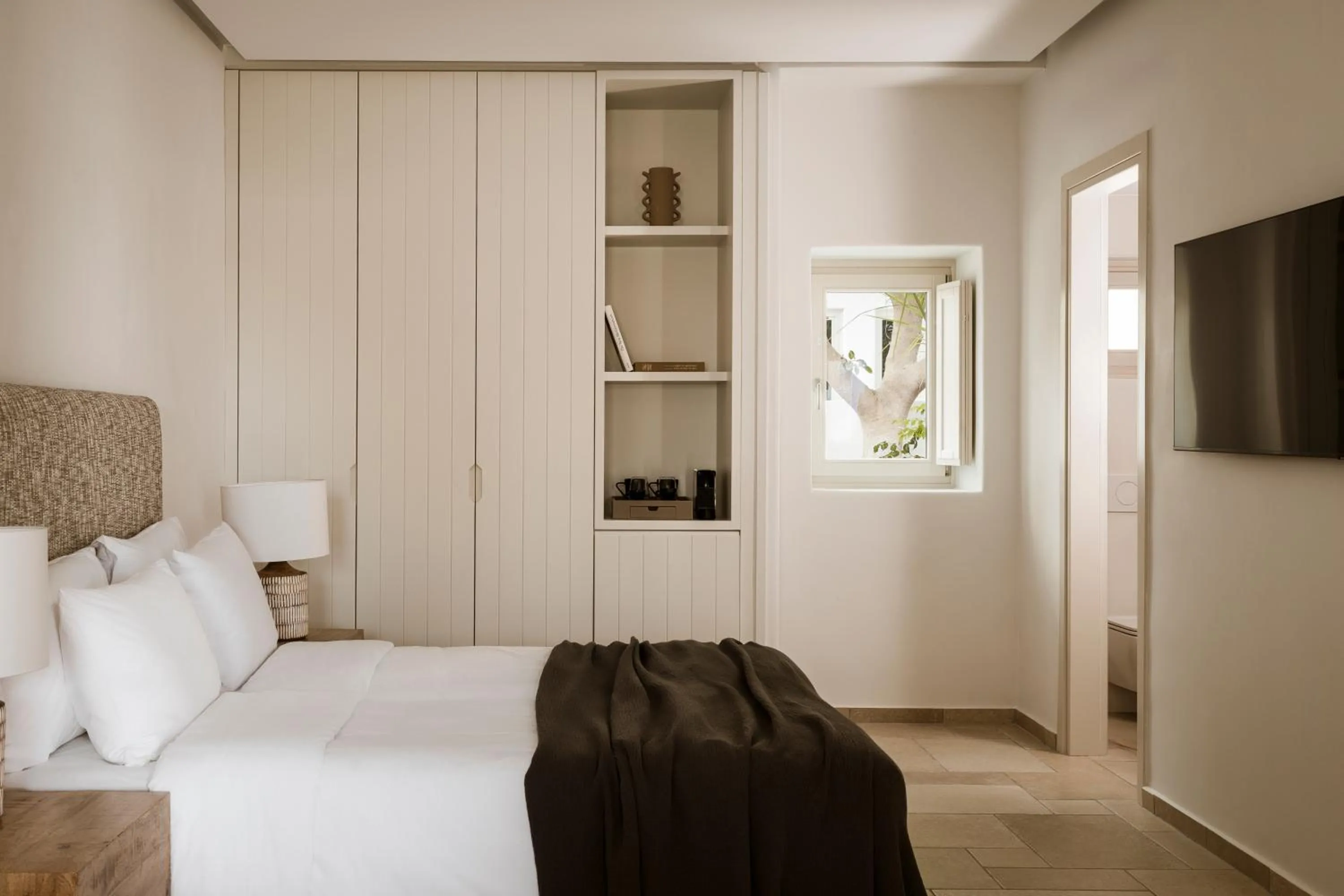 Bed in AMĀRIA Beach Resort by NOMÉE Hospitality Group