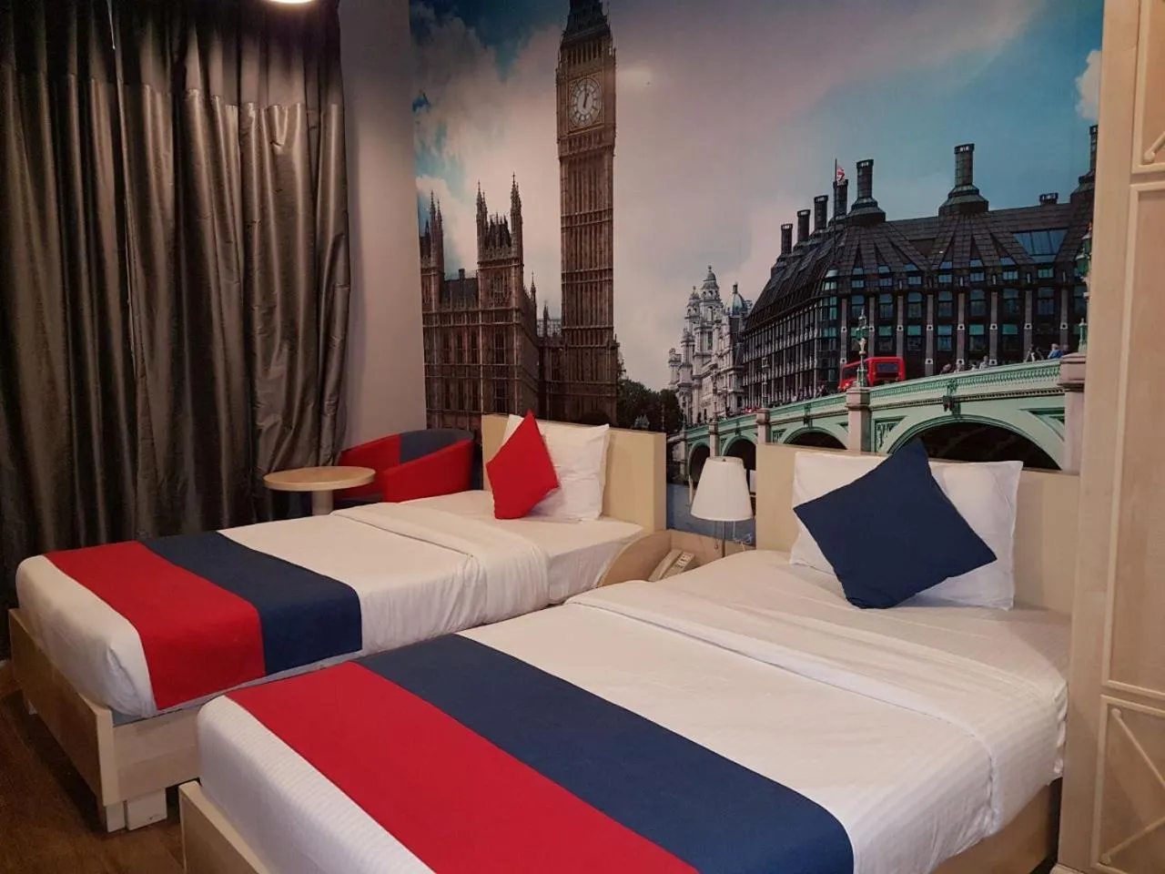 Bed in Reflections Hotel