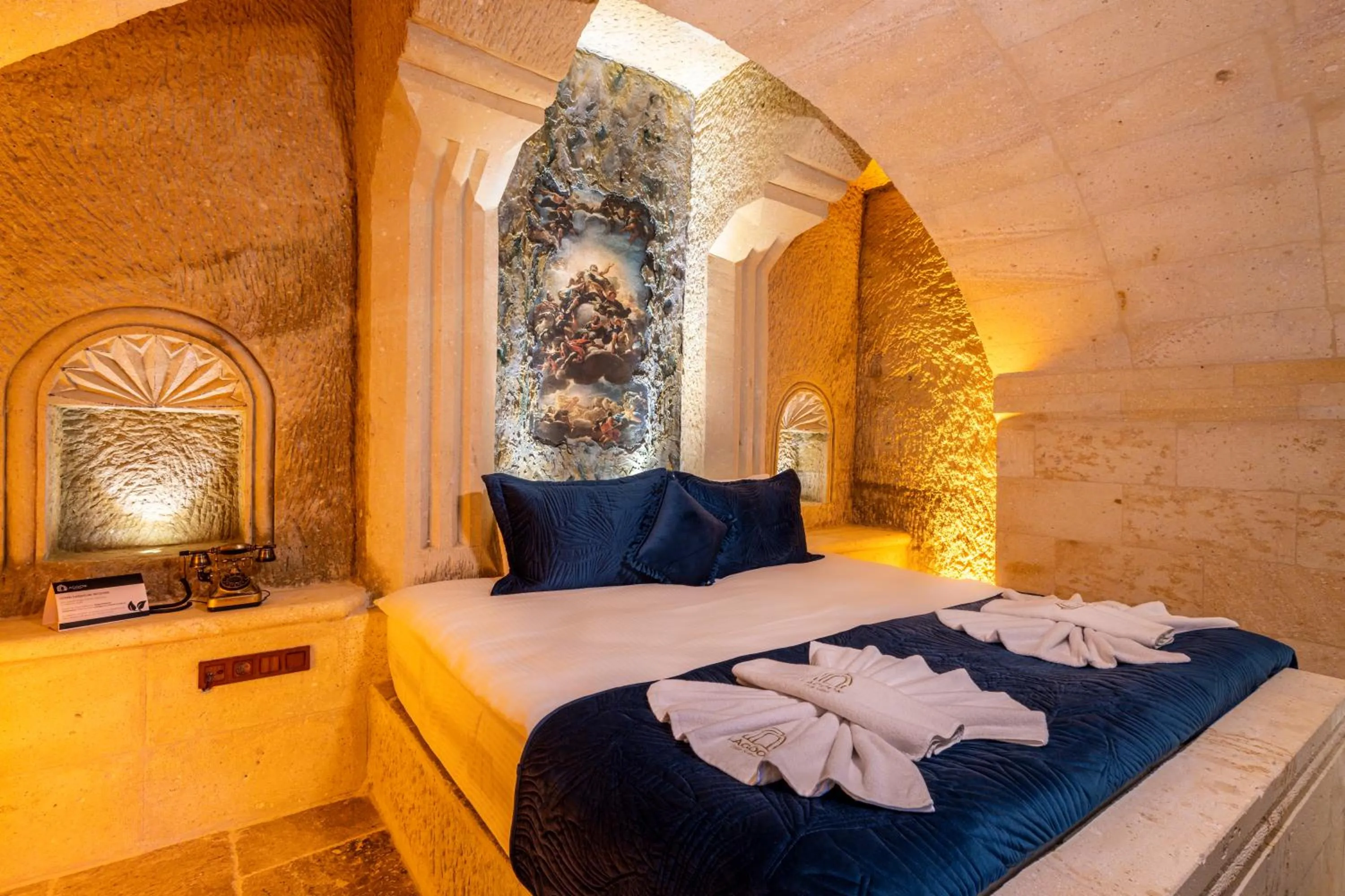 Bed in Lagoon Cave Suites