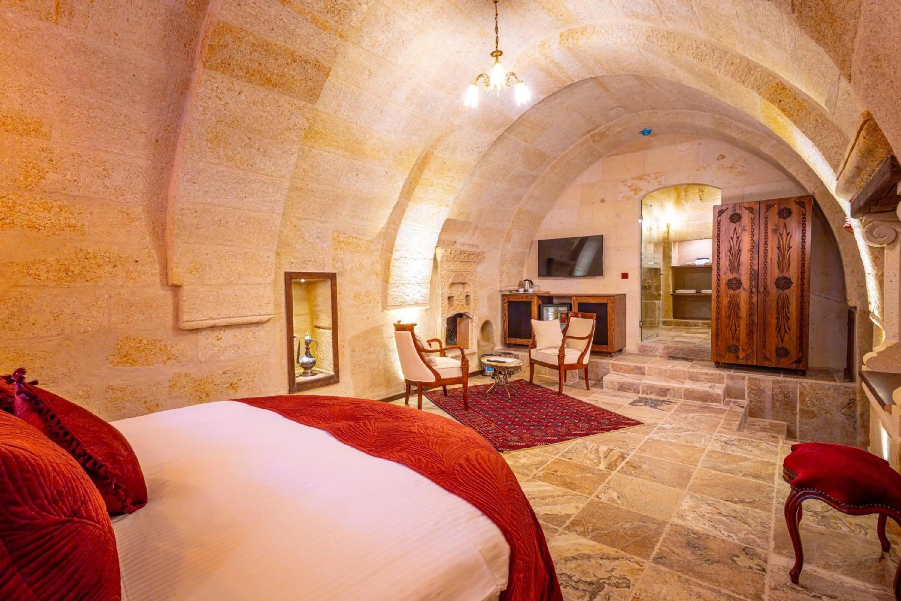 Bed in Lagoon Cave Suites