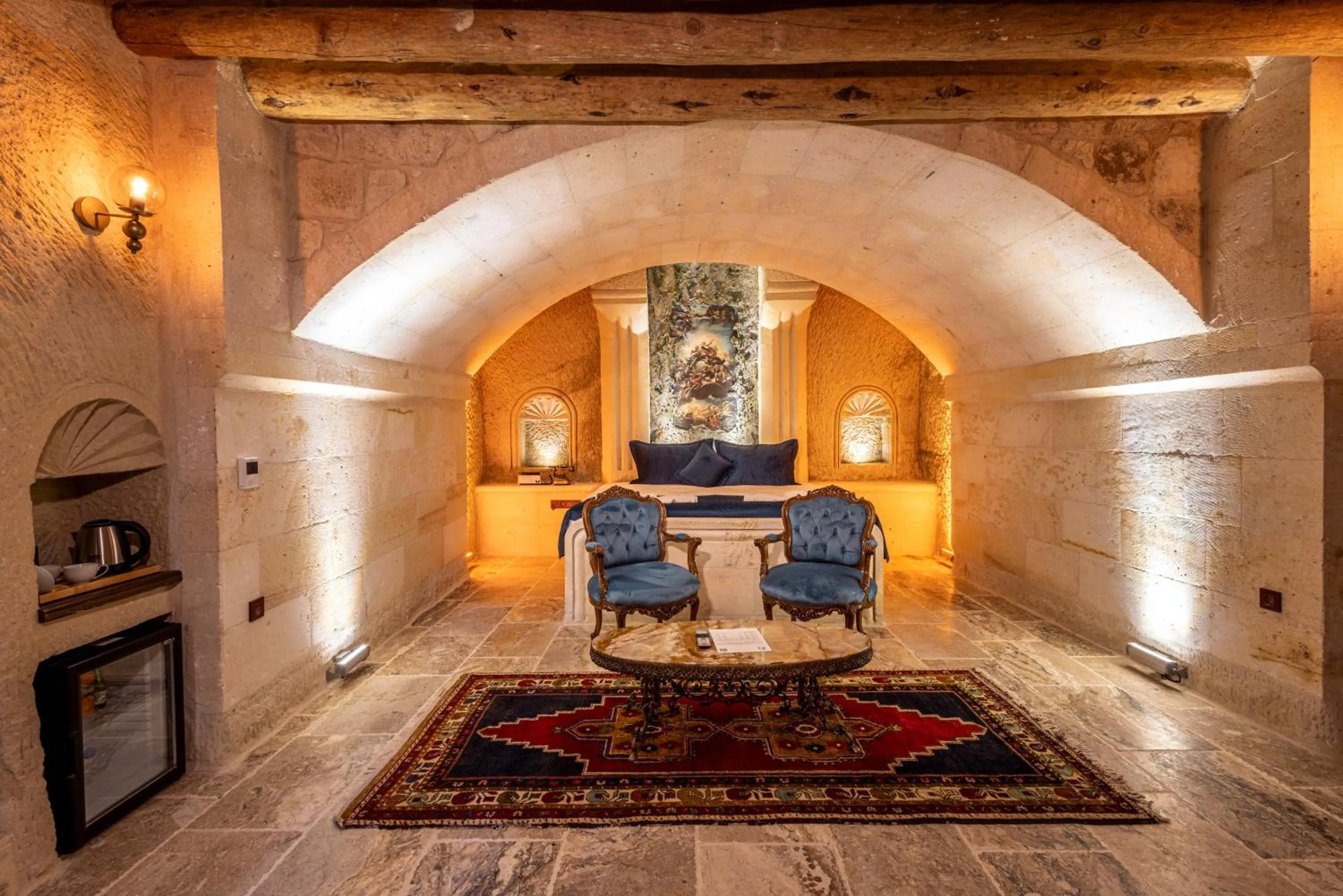 Bed in Lagoon Cave Suites