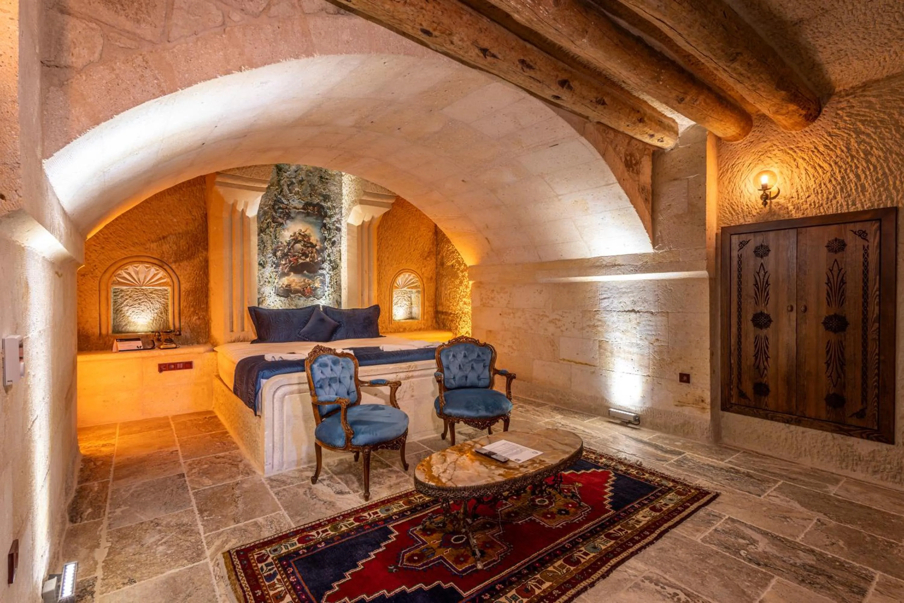 Bed in Lagoon Cave Suites