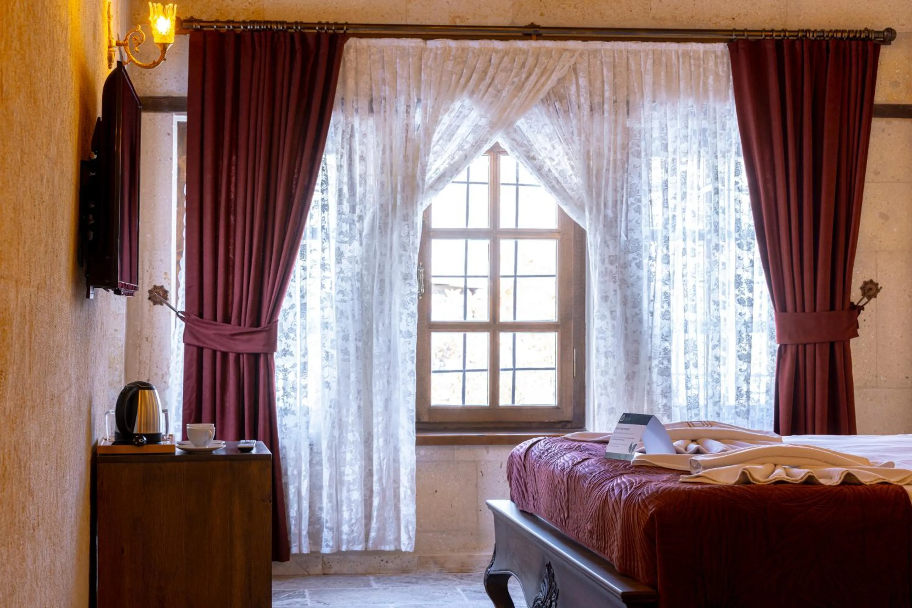 Bed in Lagoon Cave Suites