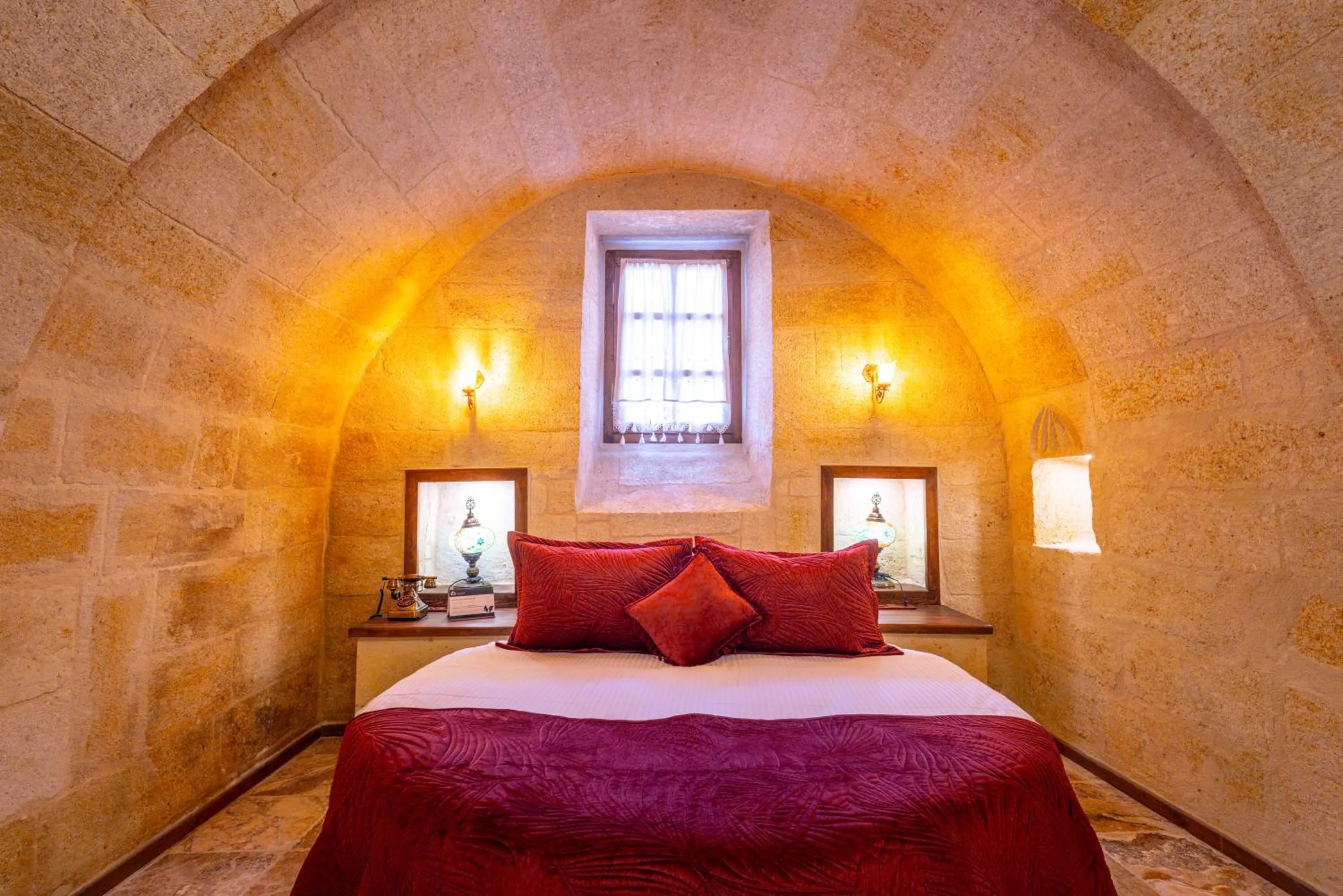 Bed in Lagoon Cave Suites