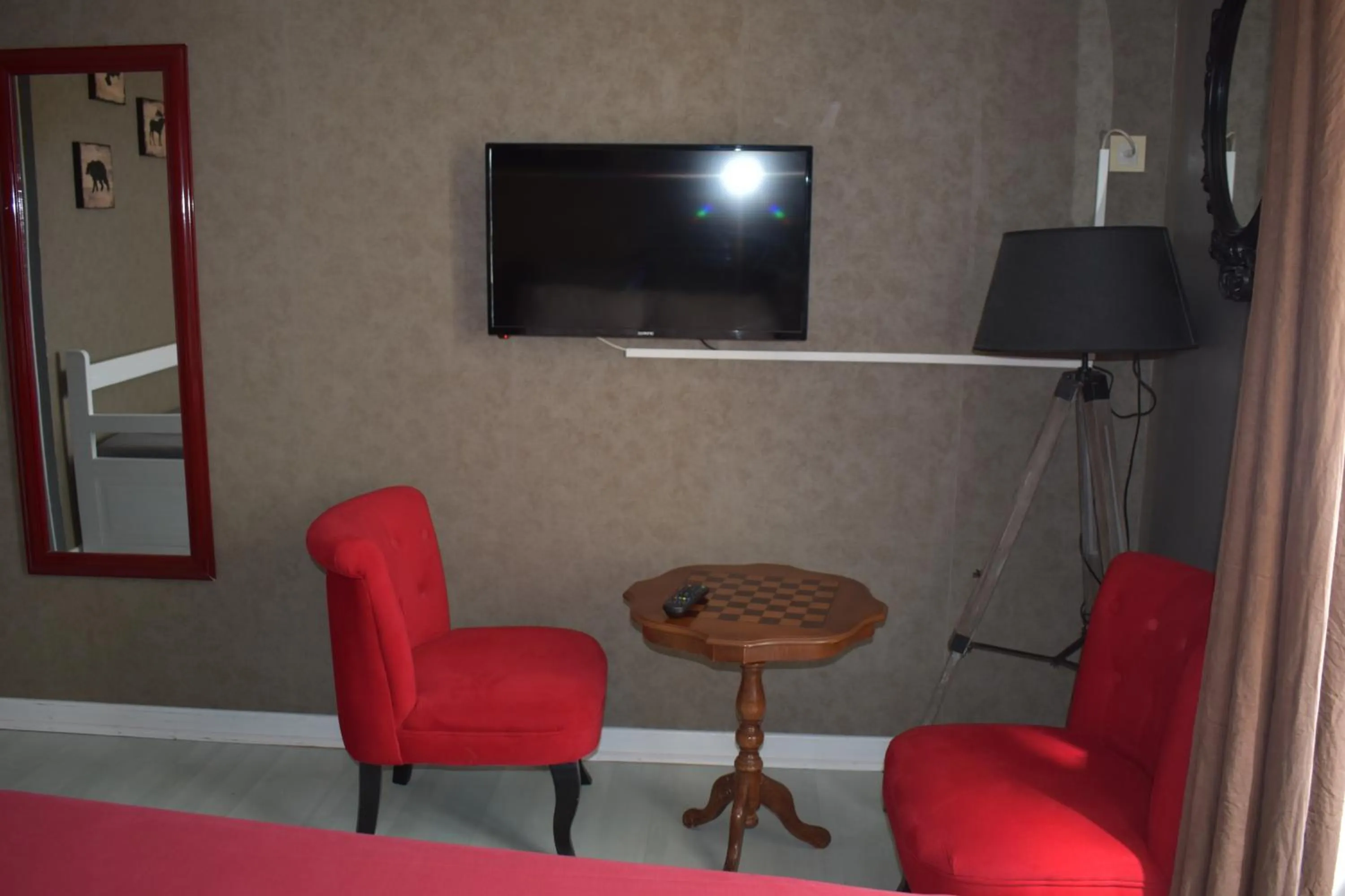 Bedroom in Hôtel Le Mélèze