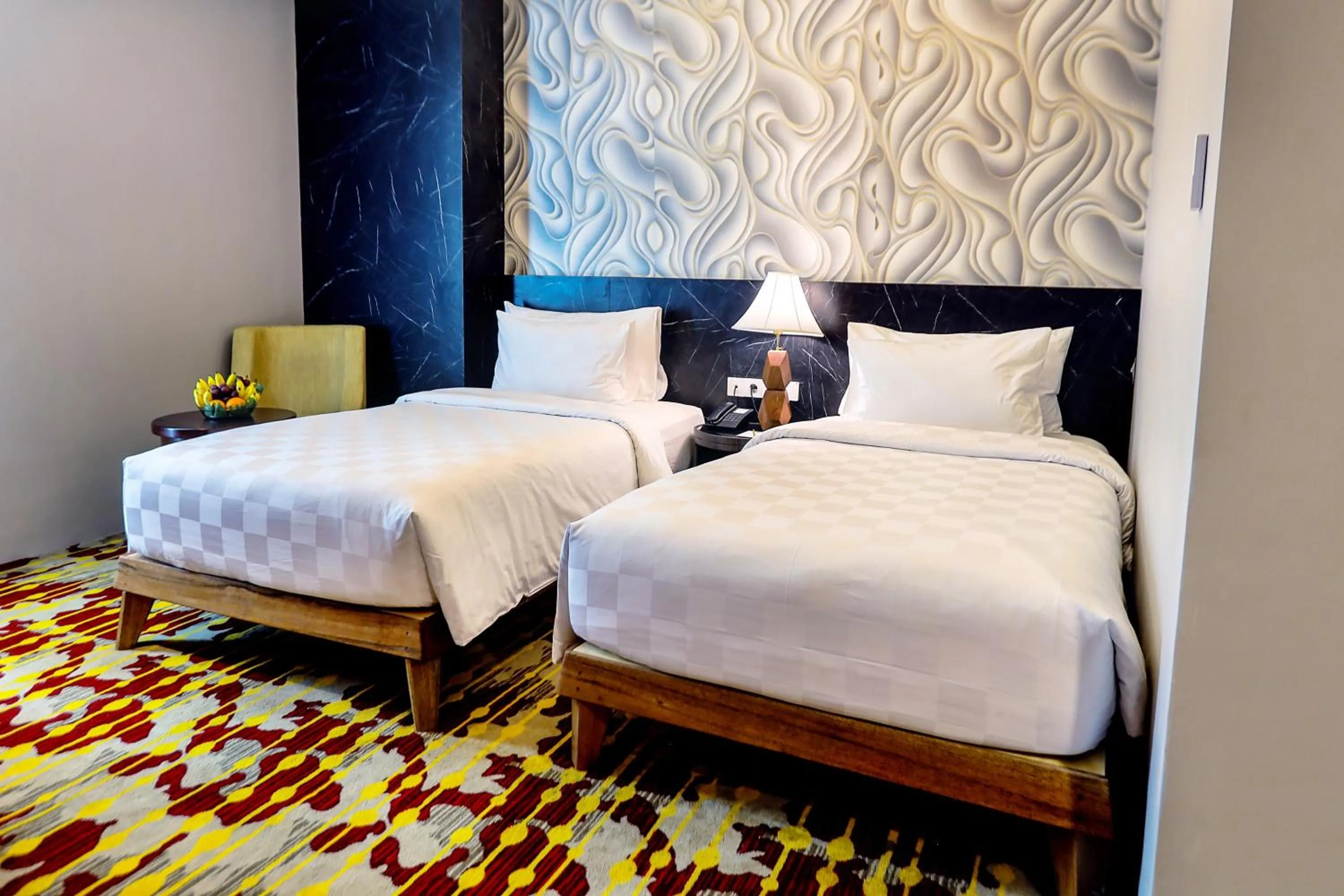 Bed in Grand Sya Hotel