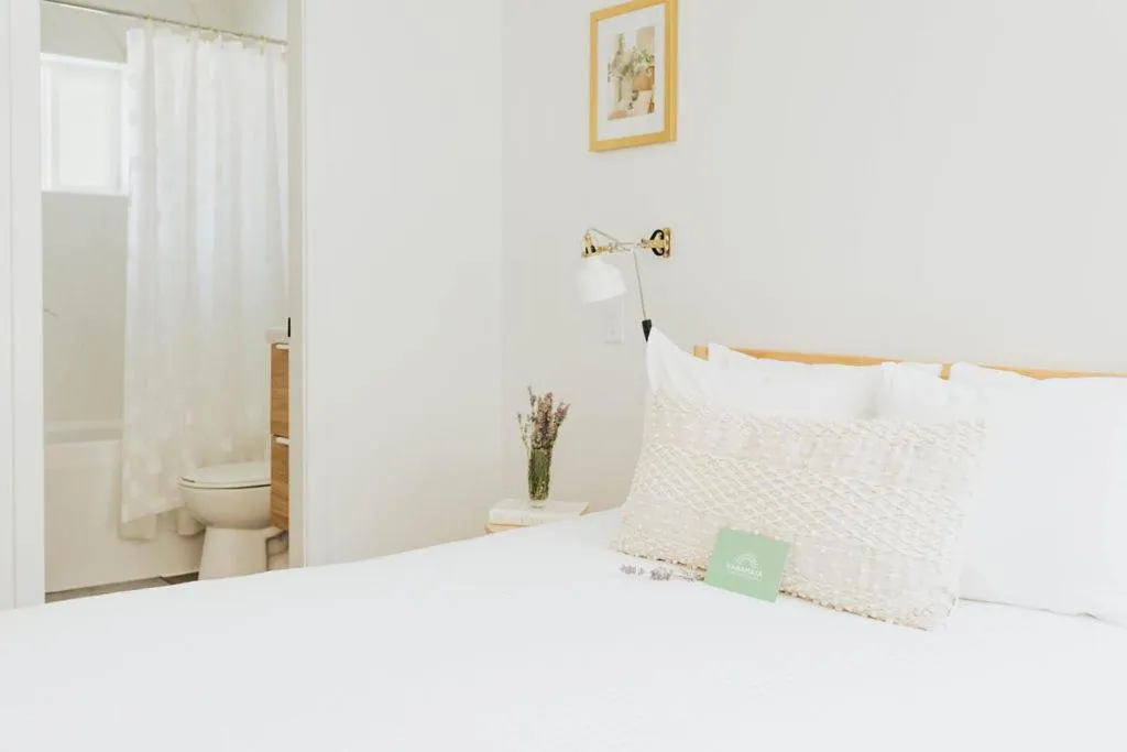 Bed in Naramata Courtyard Suites