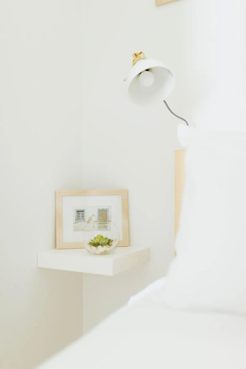 Bed in Naramata Courtyard Suites