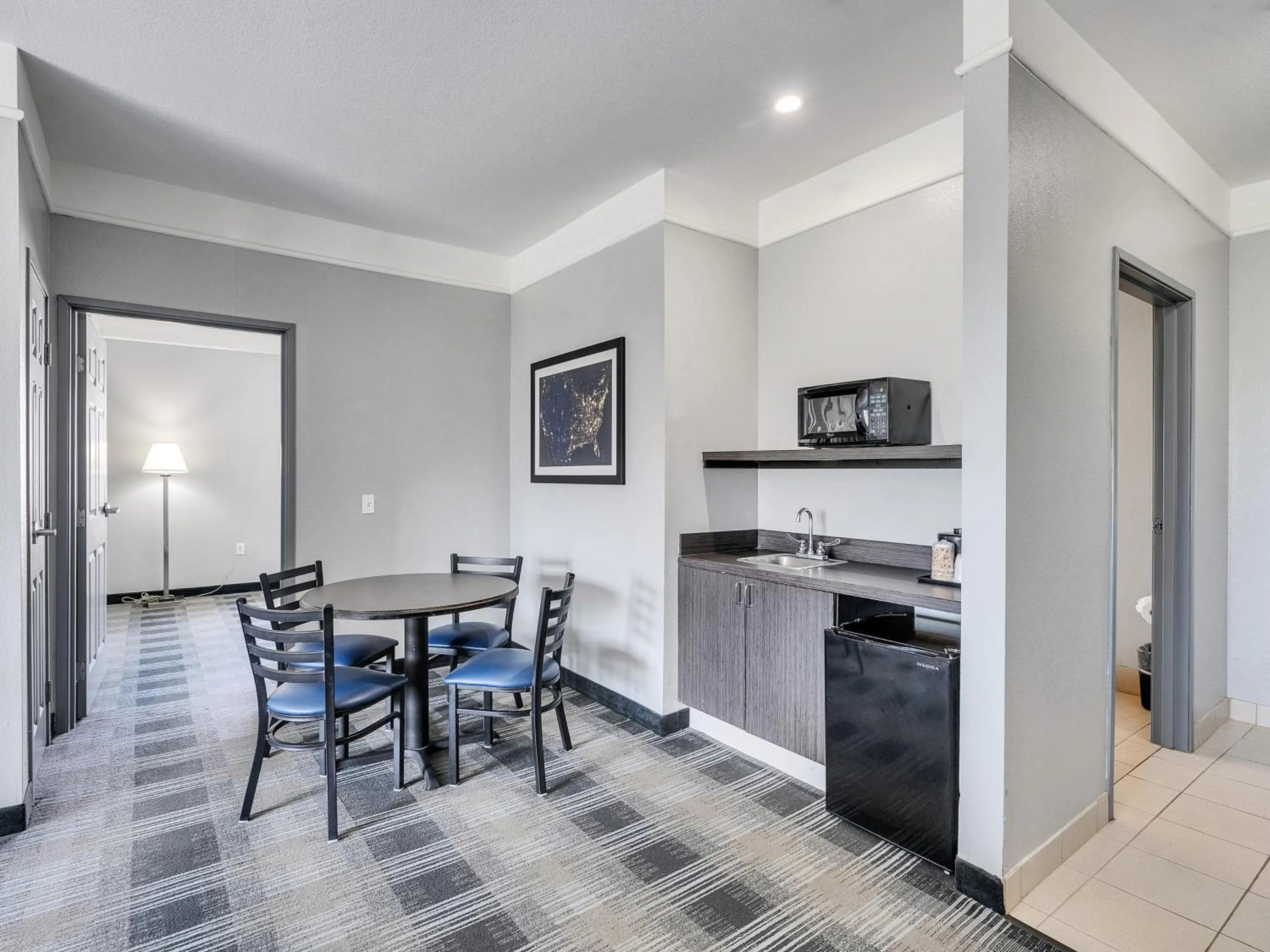 Bedroom in Platinum Inn & Suites Webster