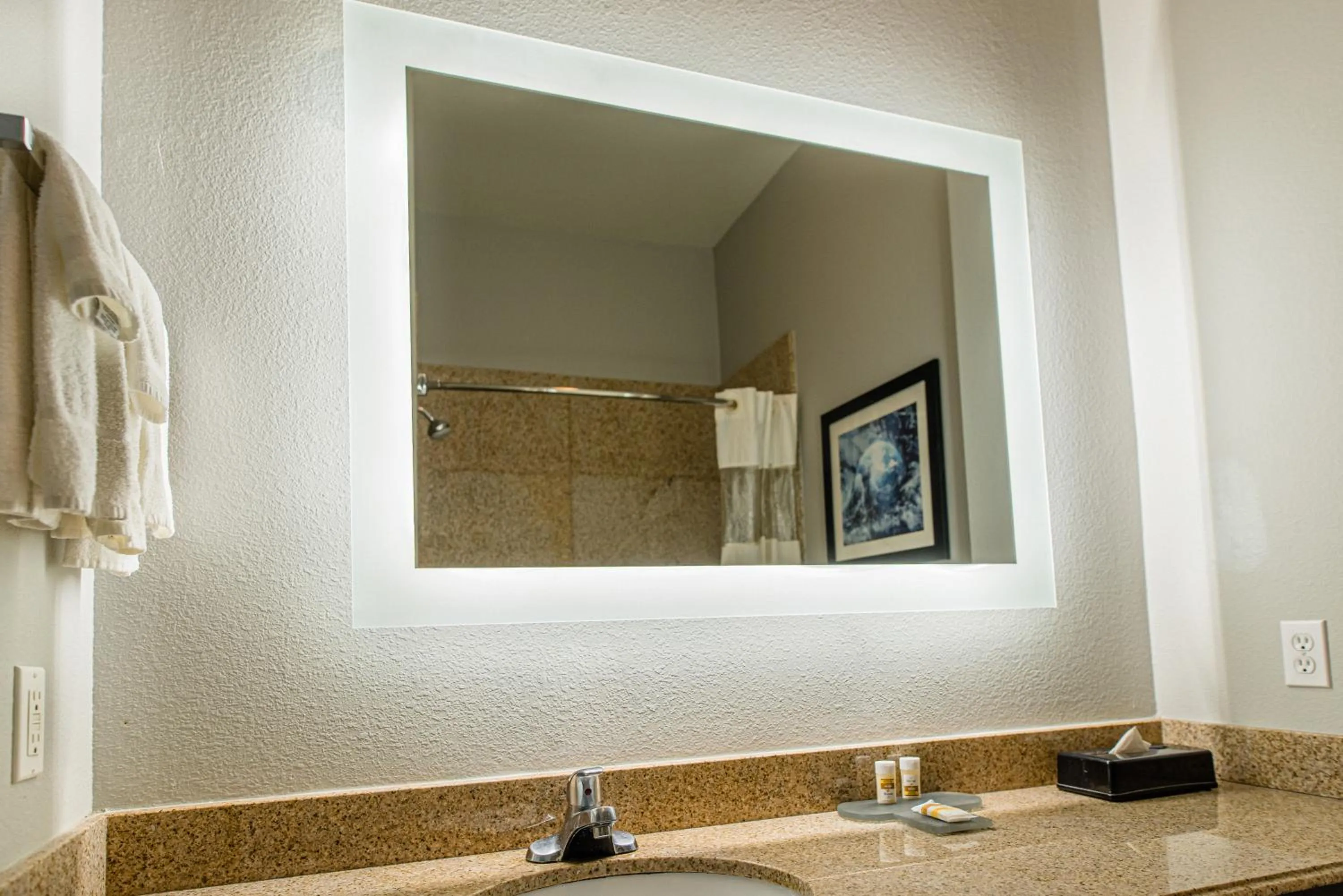 Bathroom in Platinum Inn & Suites Webster