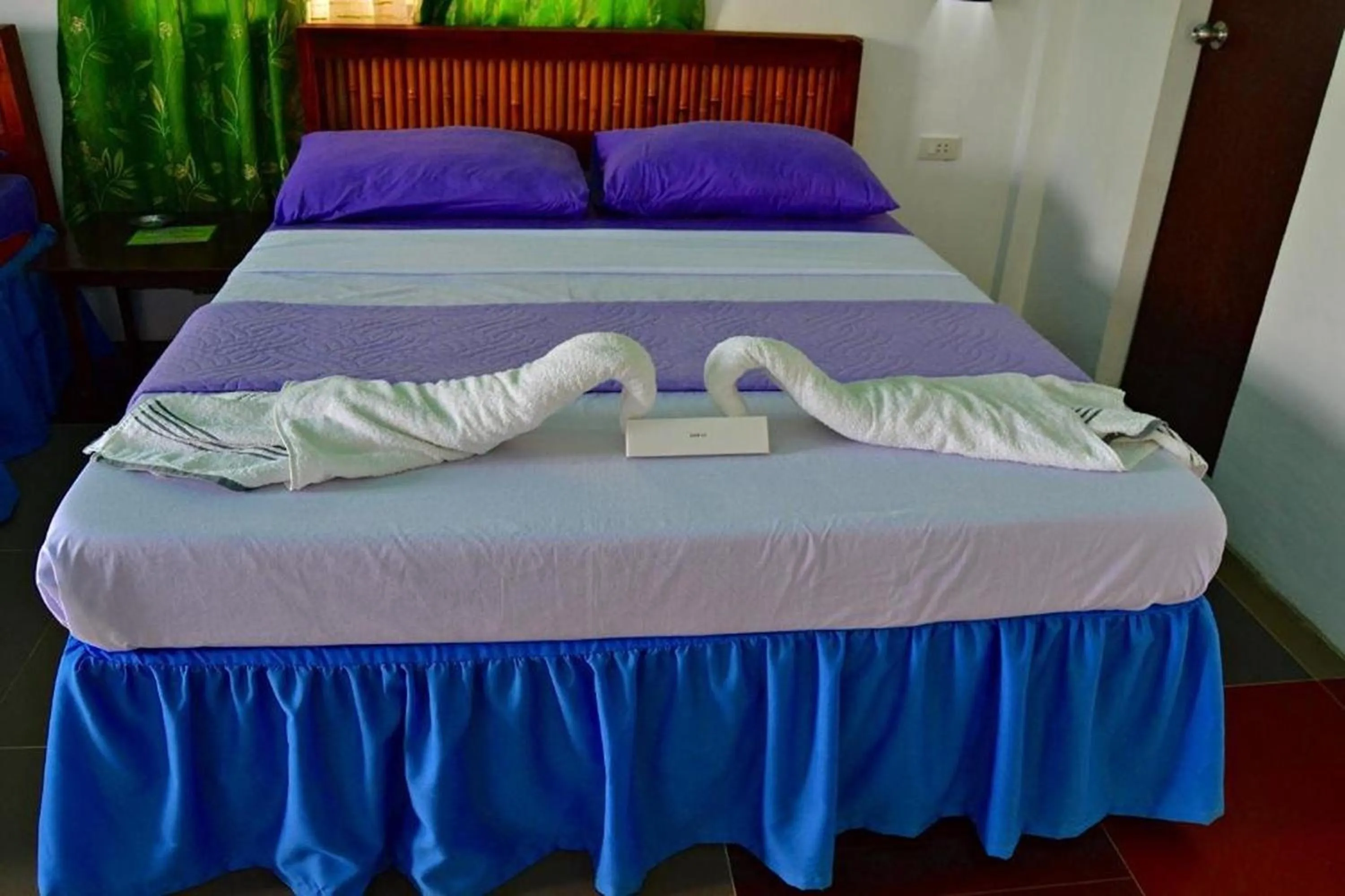 Bed in Bellevue Resort Puerto Galera