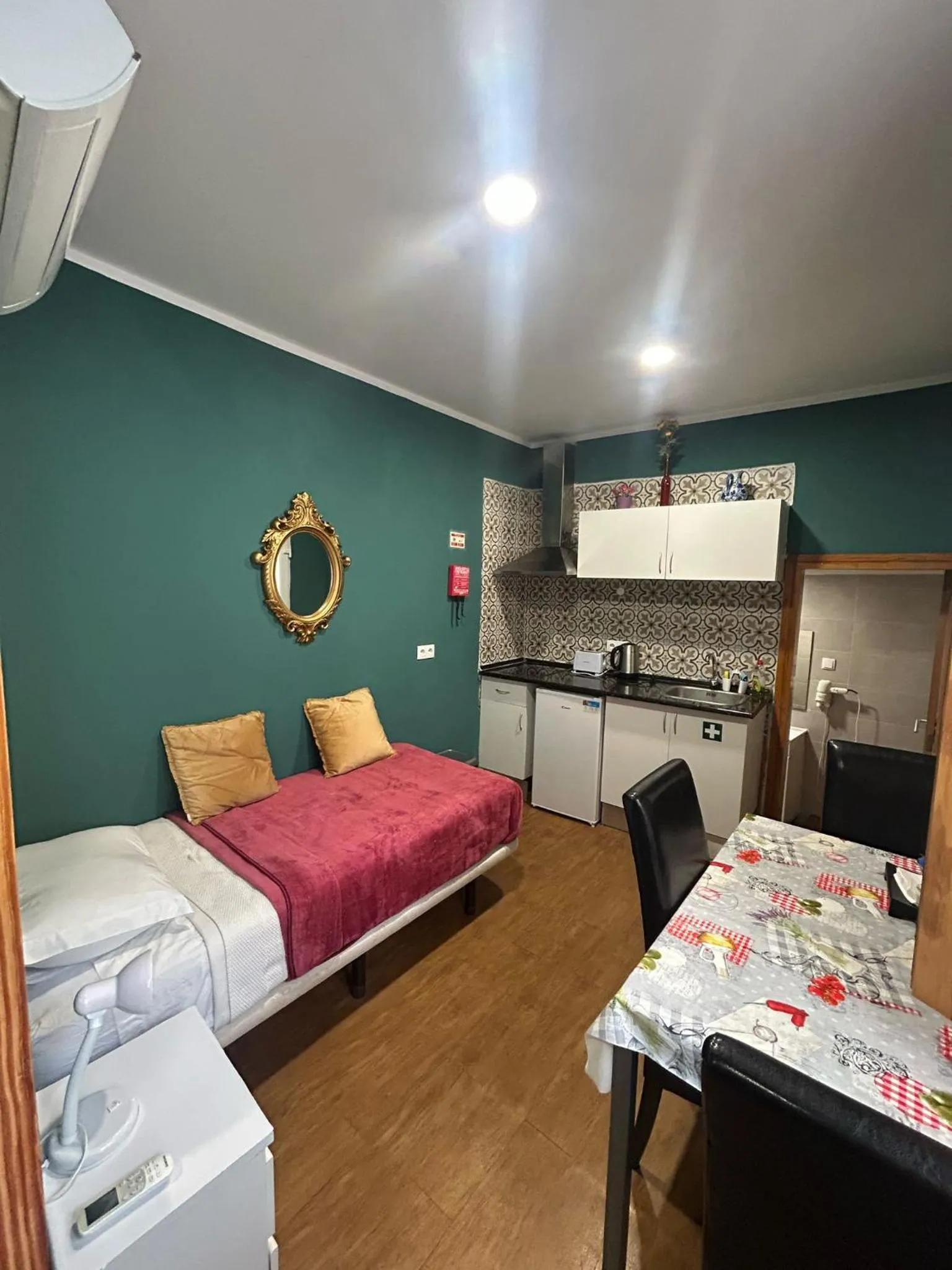 Bed in Sao Jorge Apartments & Suites