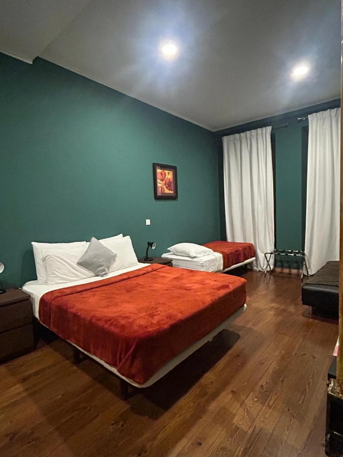 Bed in Sao Jorge Apartments & Suites