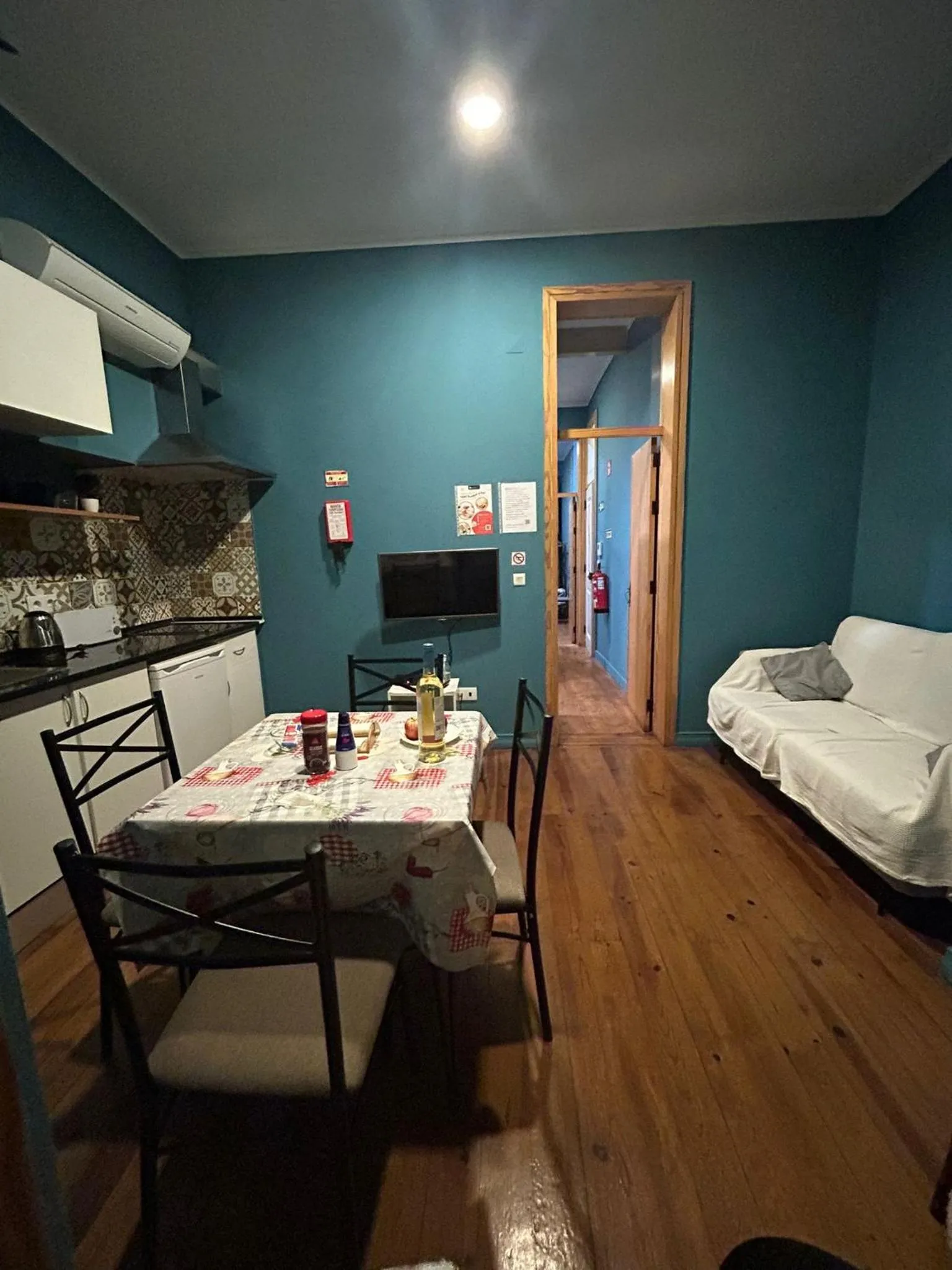 Kitchen or kitchenette, Bed in Sao Jorge Apartments & Suites