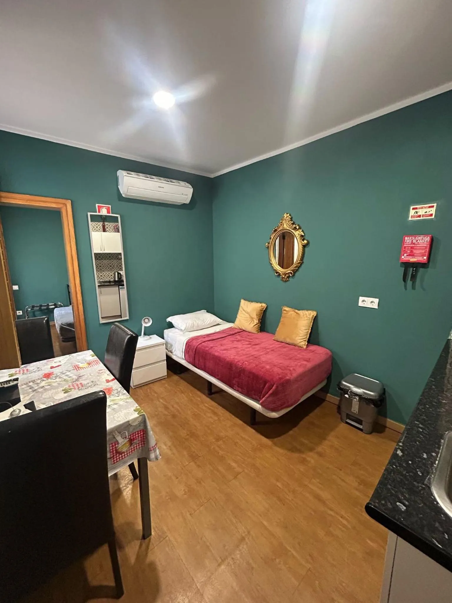 Bed in Sao Jorge Apartments & Suites