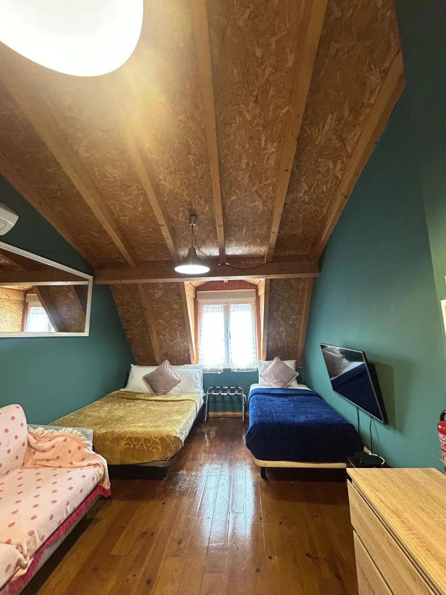 Bed in Sao Jorge Apartments & Suites