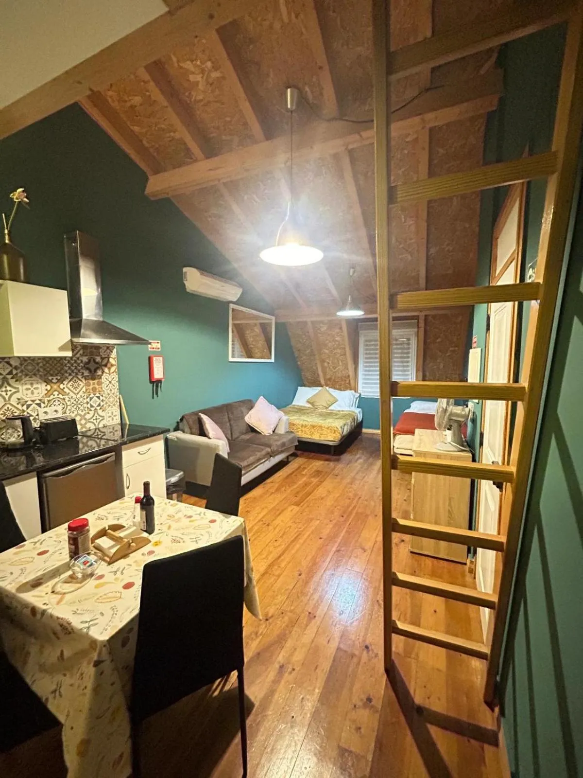 Bed in Sao Jorge Apartments & Suites