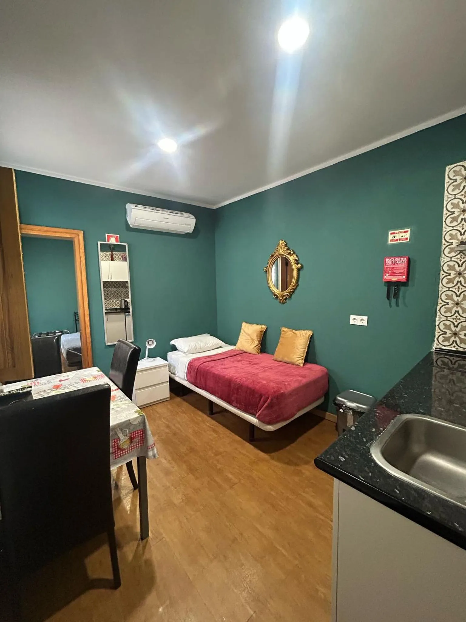 Bed in Sao Jorge Apartments & Suites