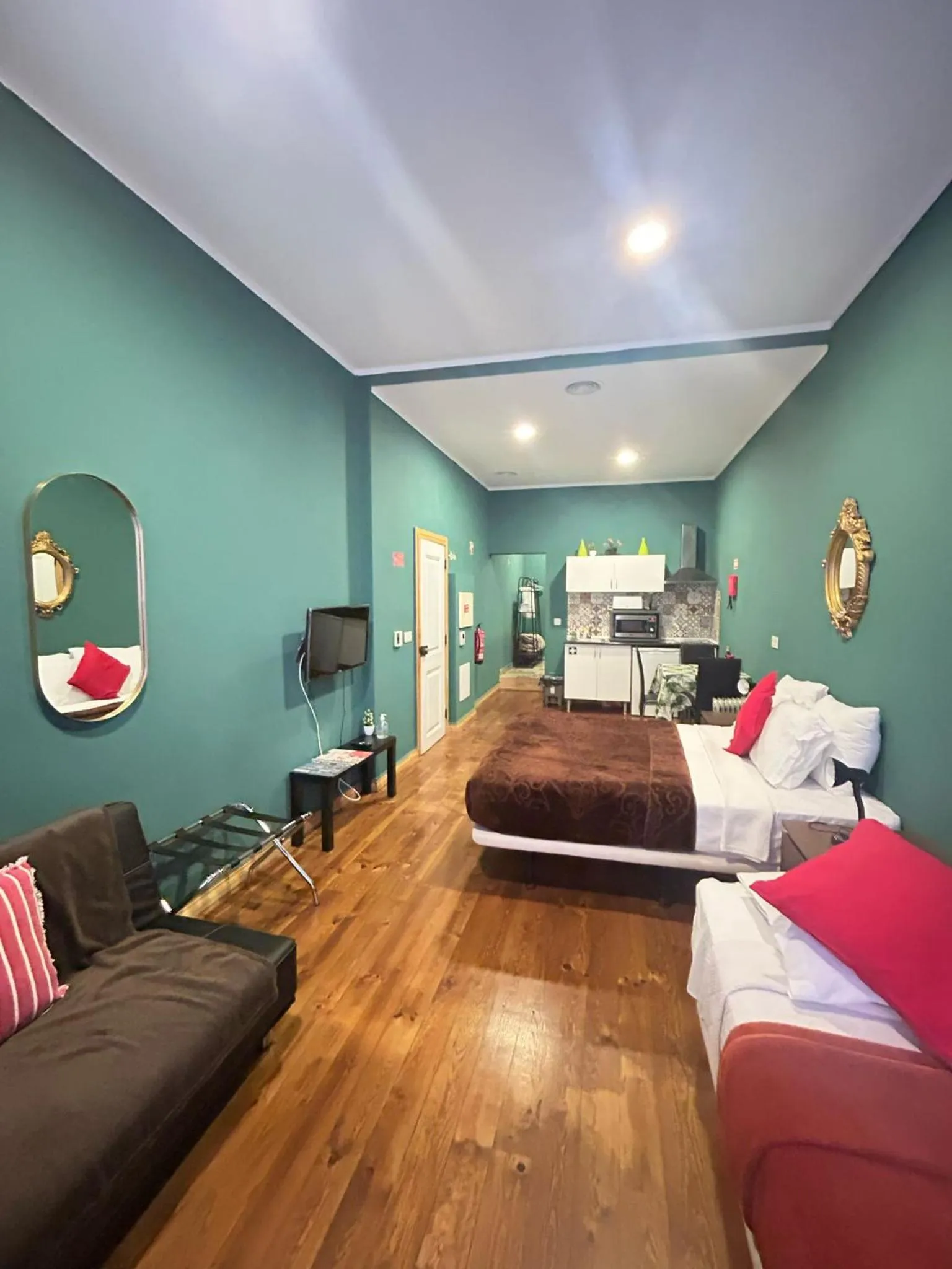 Bed in Sao Jorge Apartments & Suites