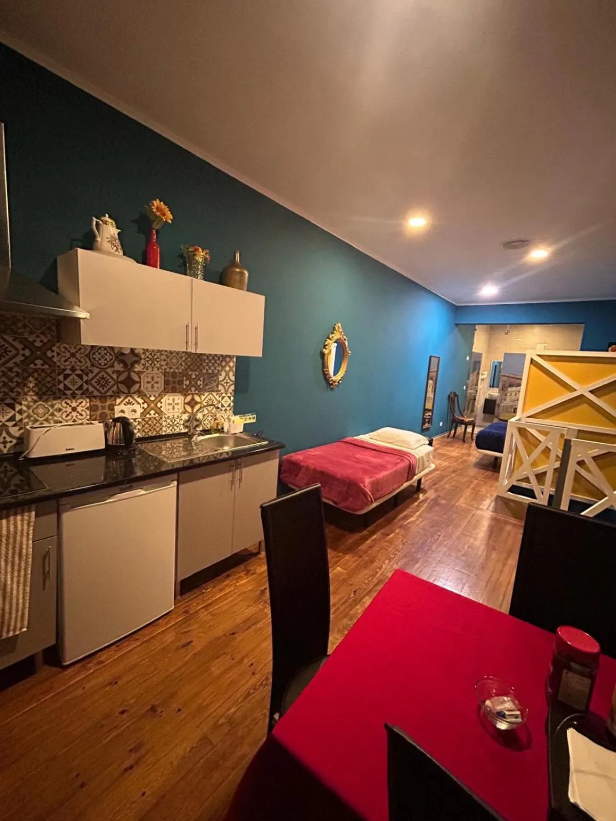 Bed in Sao Jorge Apartments & Suites