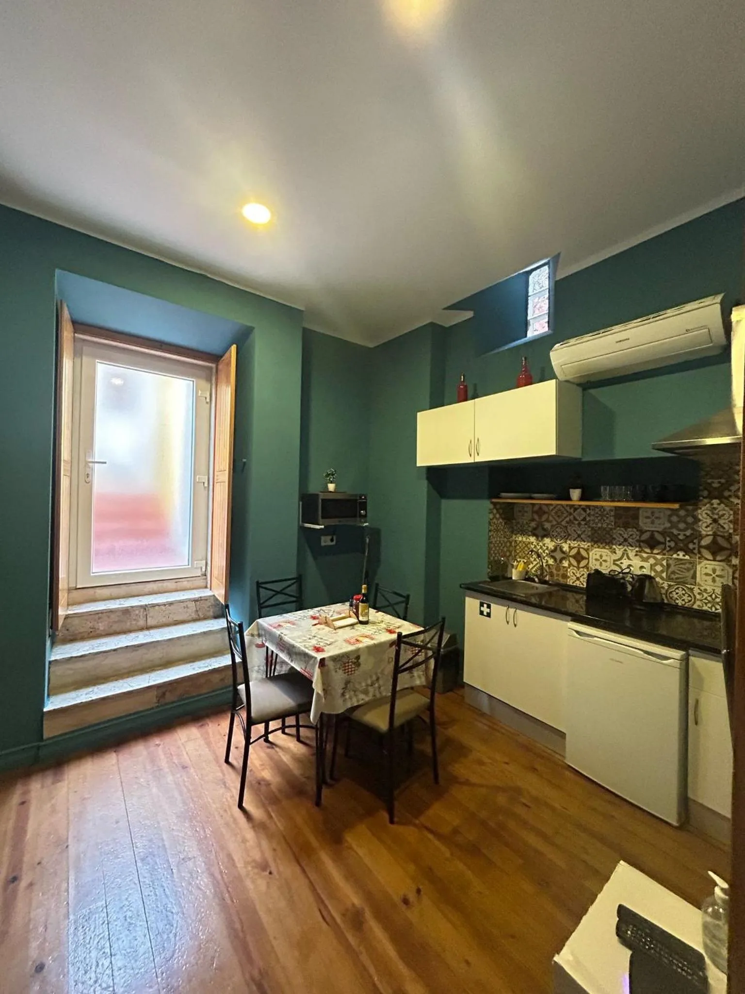 Kitchen or kitchenette in Sao Jorge Apartments & Suites