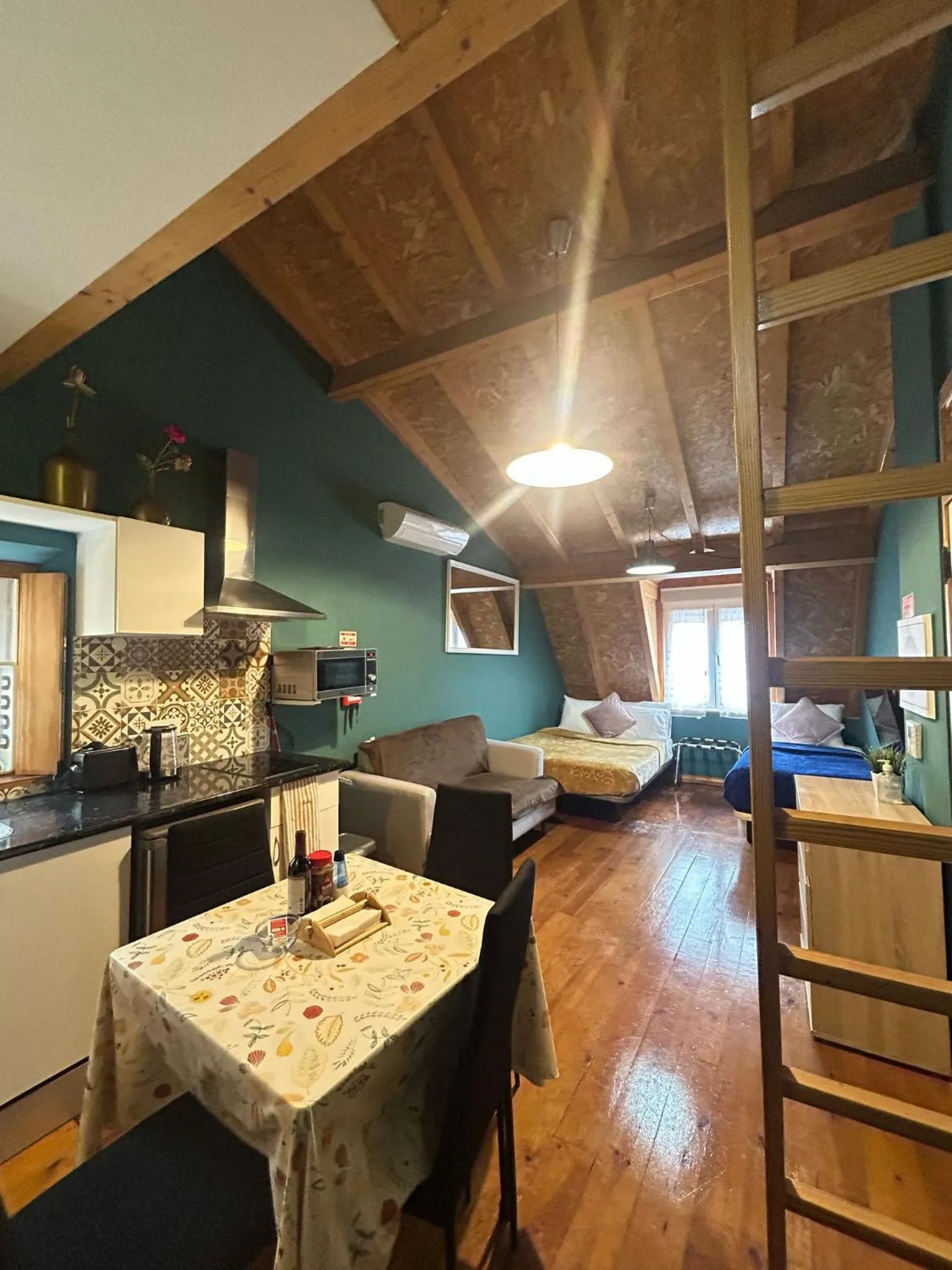 Bed in Sao Jorge Apartments & Suites