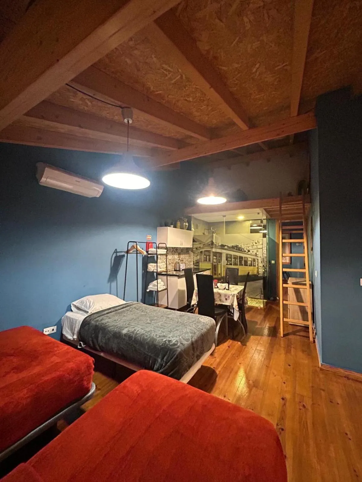 Bed in Sao Jorge Apartments & Suites