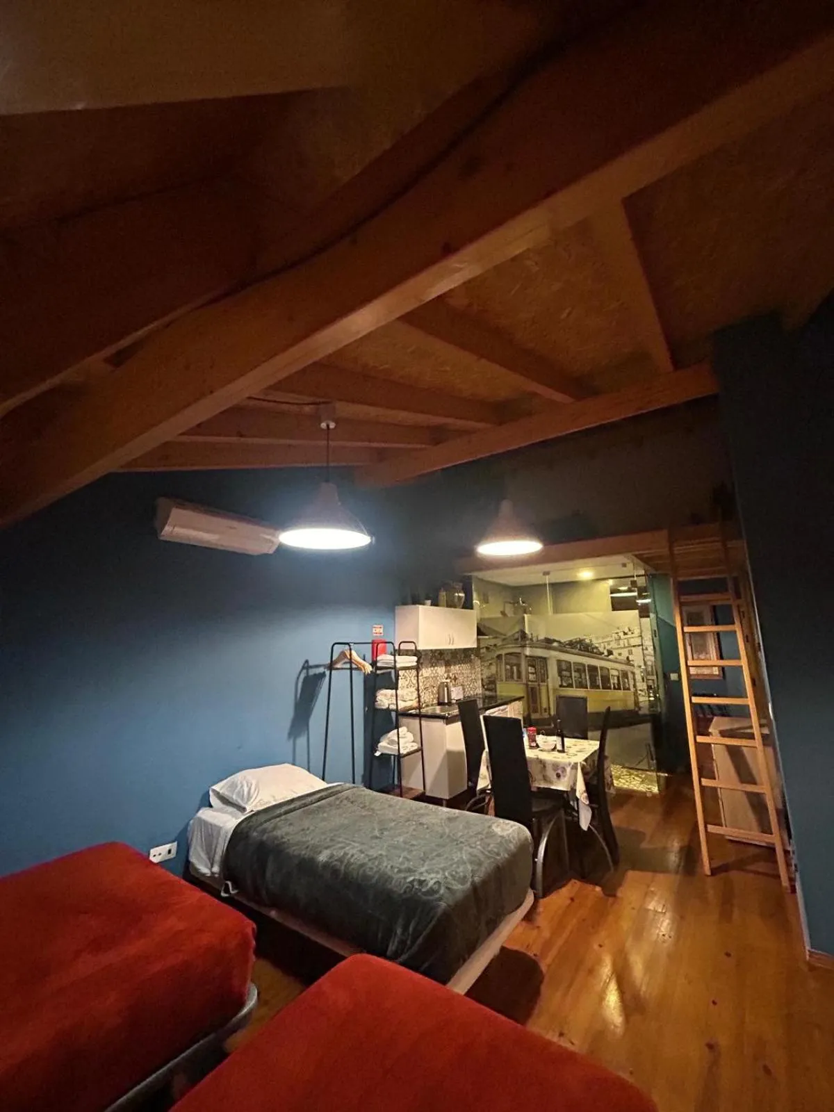 Bed in Sao Jorge Apartments & Suites