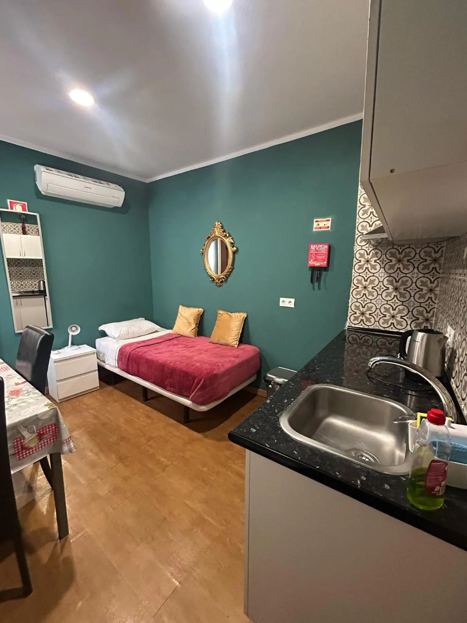 Bed in Sao Jorge Apartments & Suites