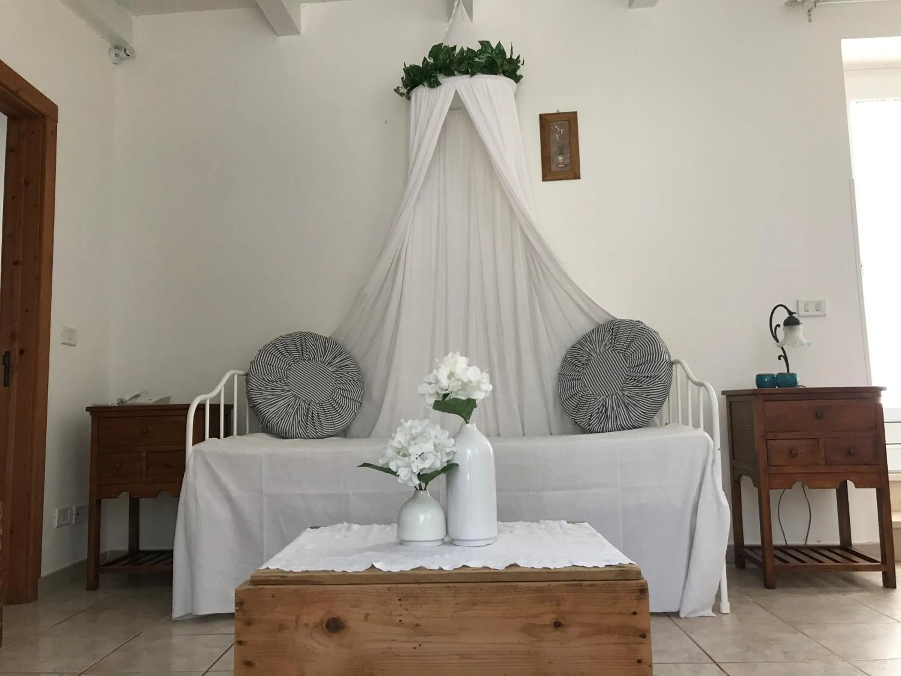 Seating area, Bed in Aria di Casa Country Resort