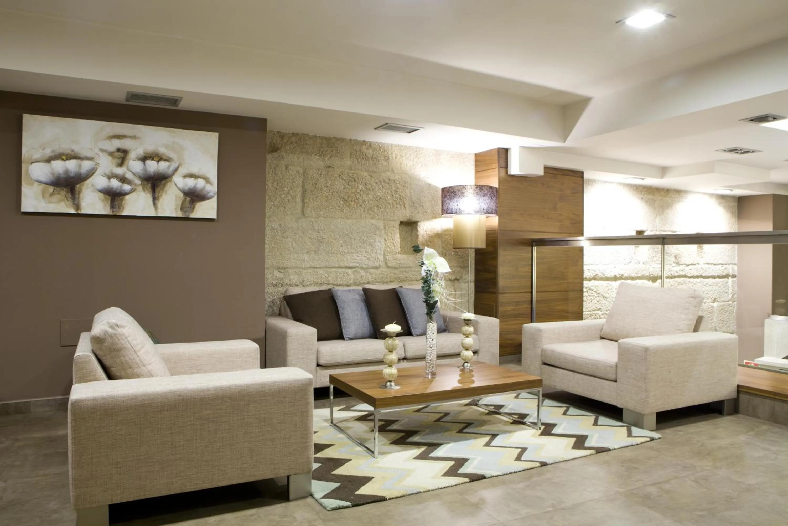 Communal lounge/ TV room in Hotel Arsus