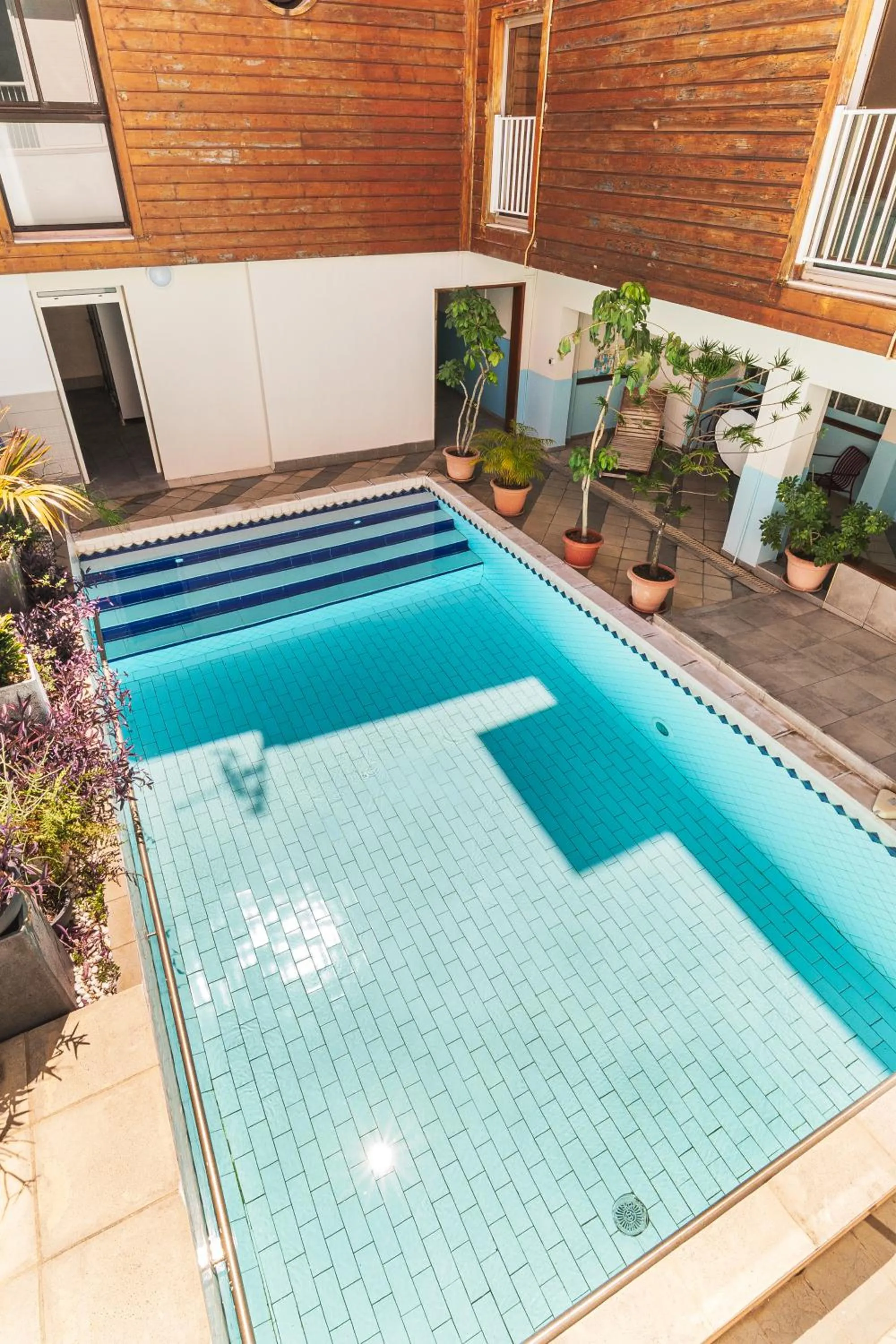 Swimming pool in Hotel Austral by Exsel