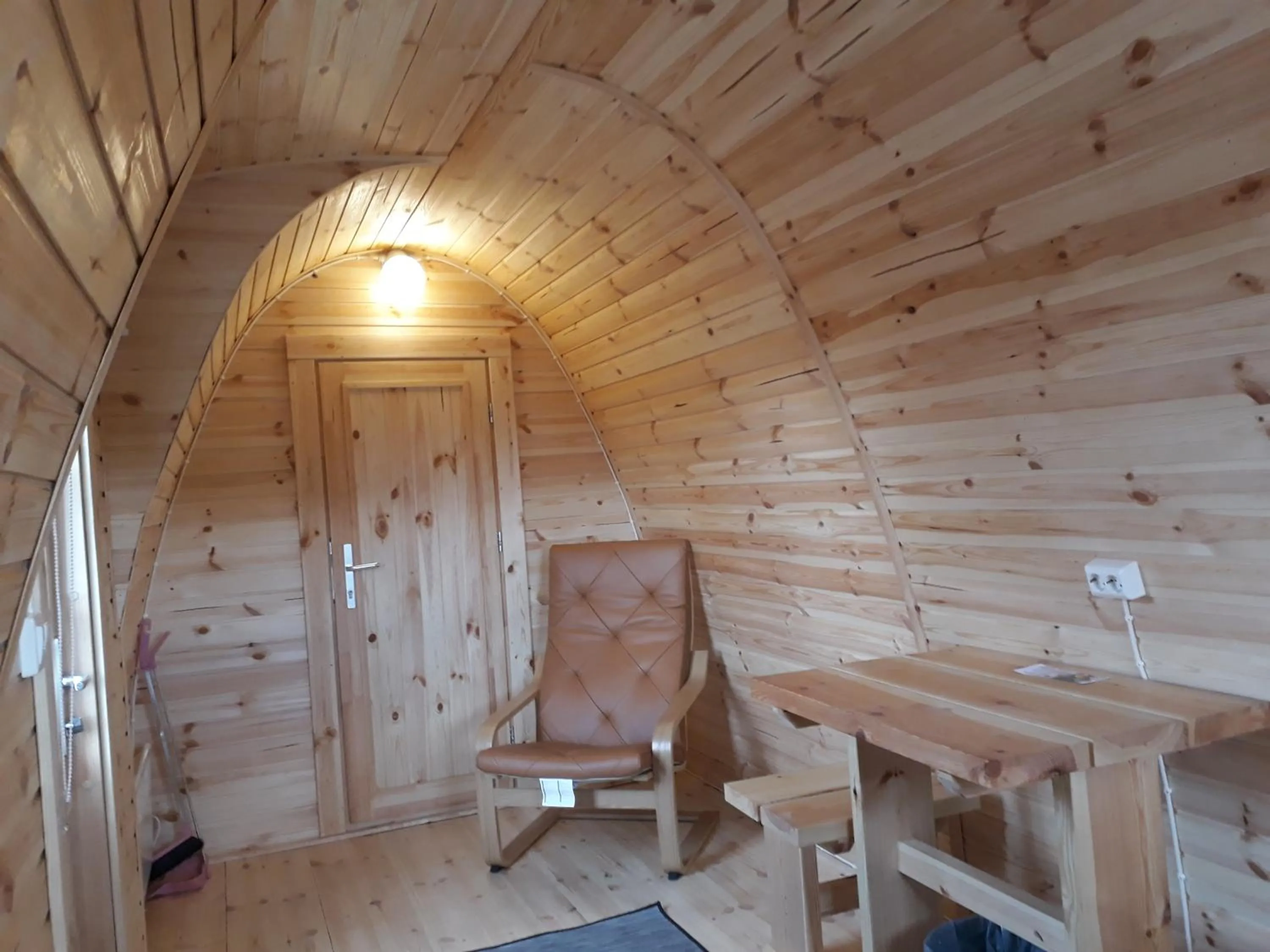 Seating area in Fossatun Camping Pods & Cottages - Sleeping Bag Accommodation