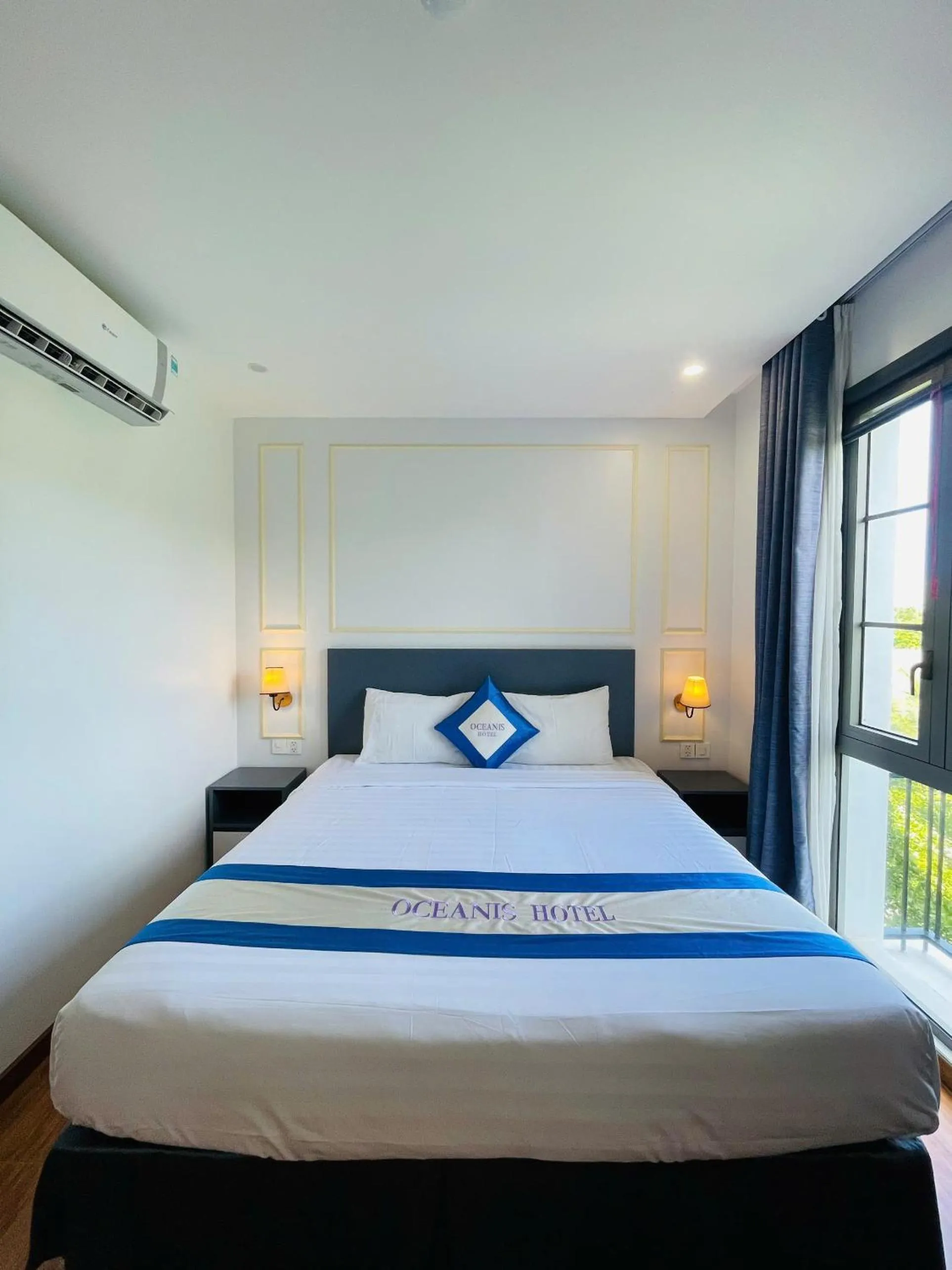 Bed in Oceanis Hotel