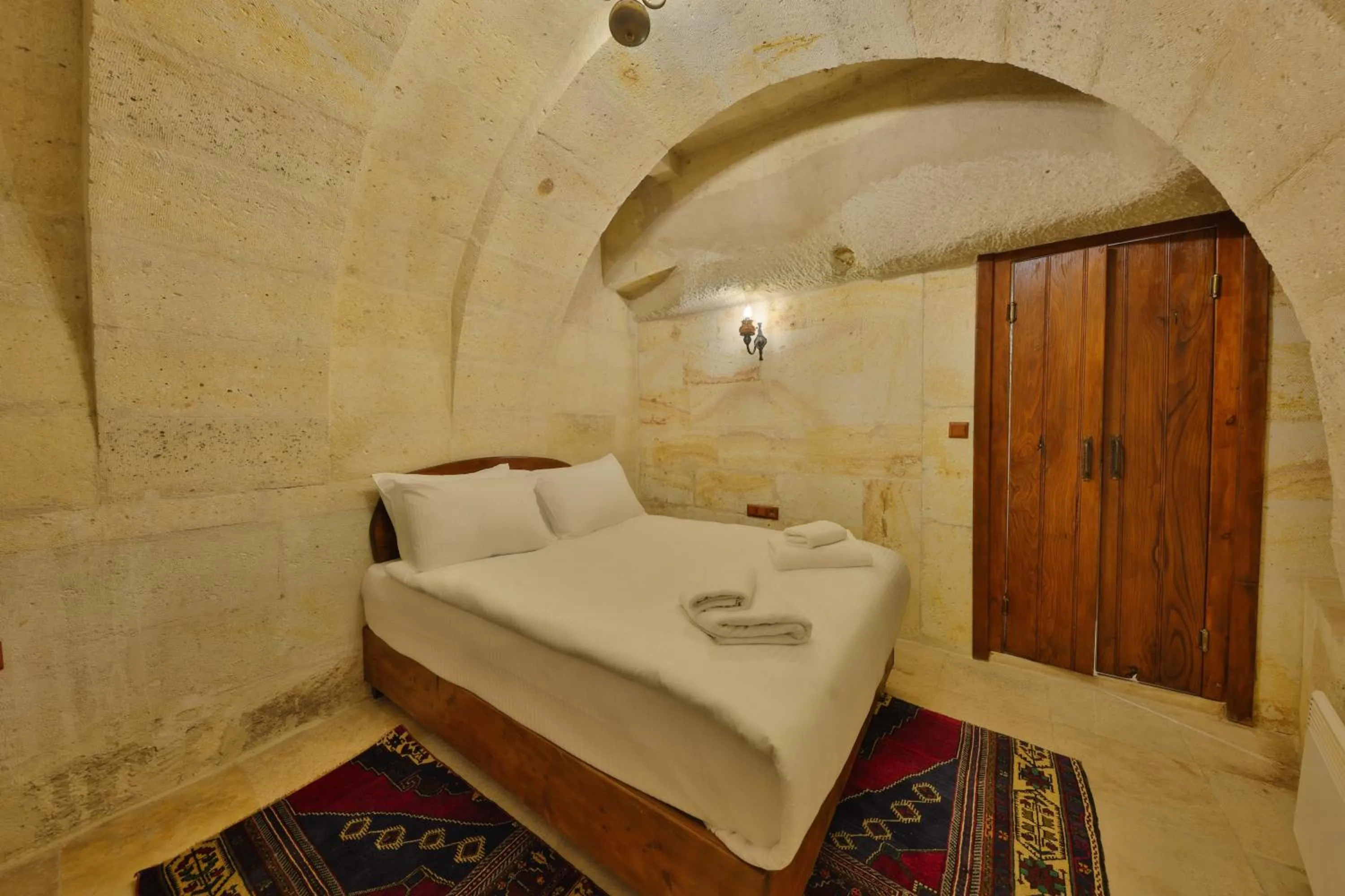 Bed in Nora Cave Hotel