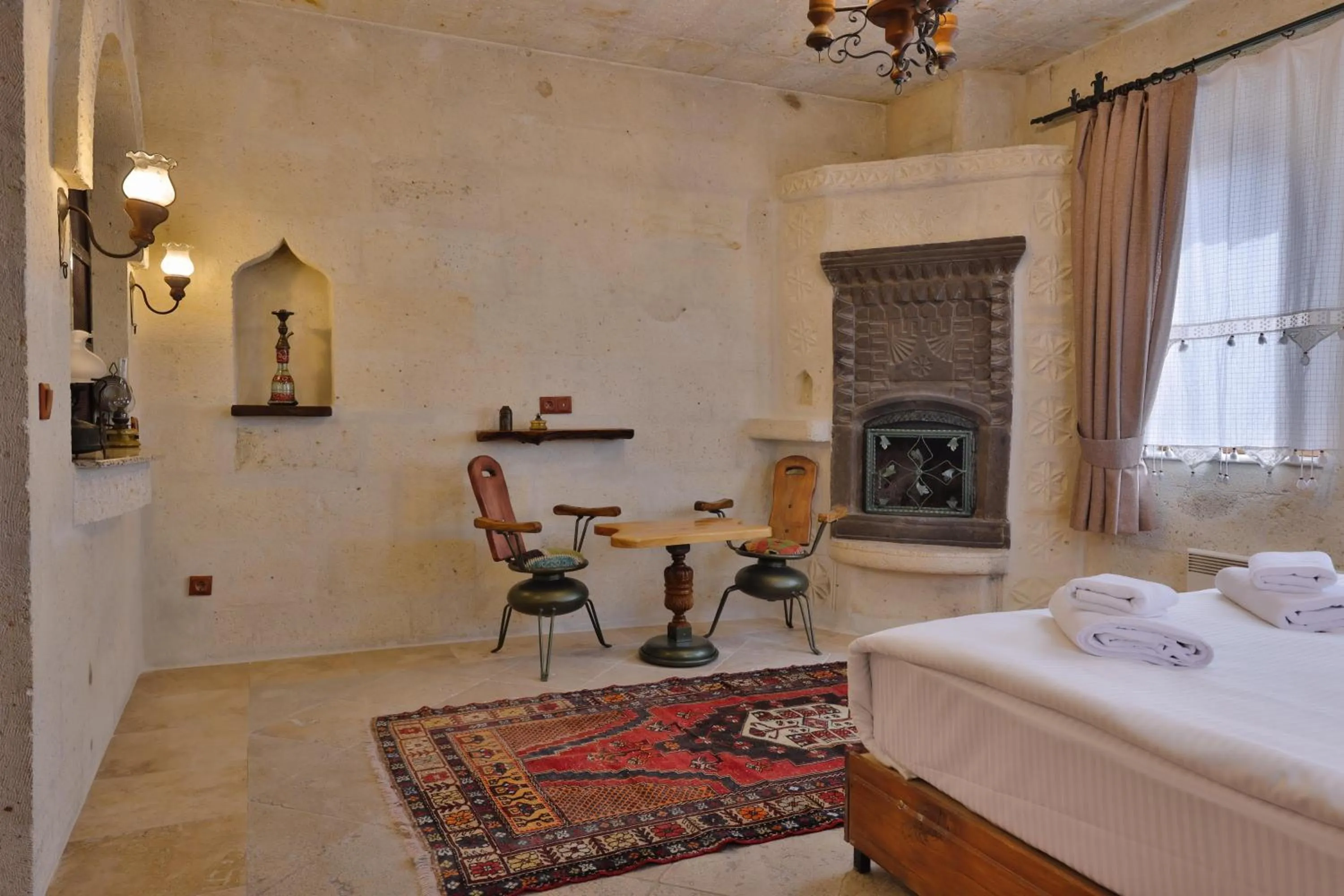 Seating area, Bed in Nora Cave Hotel