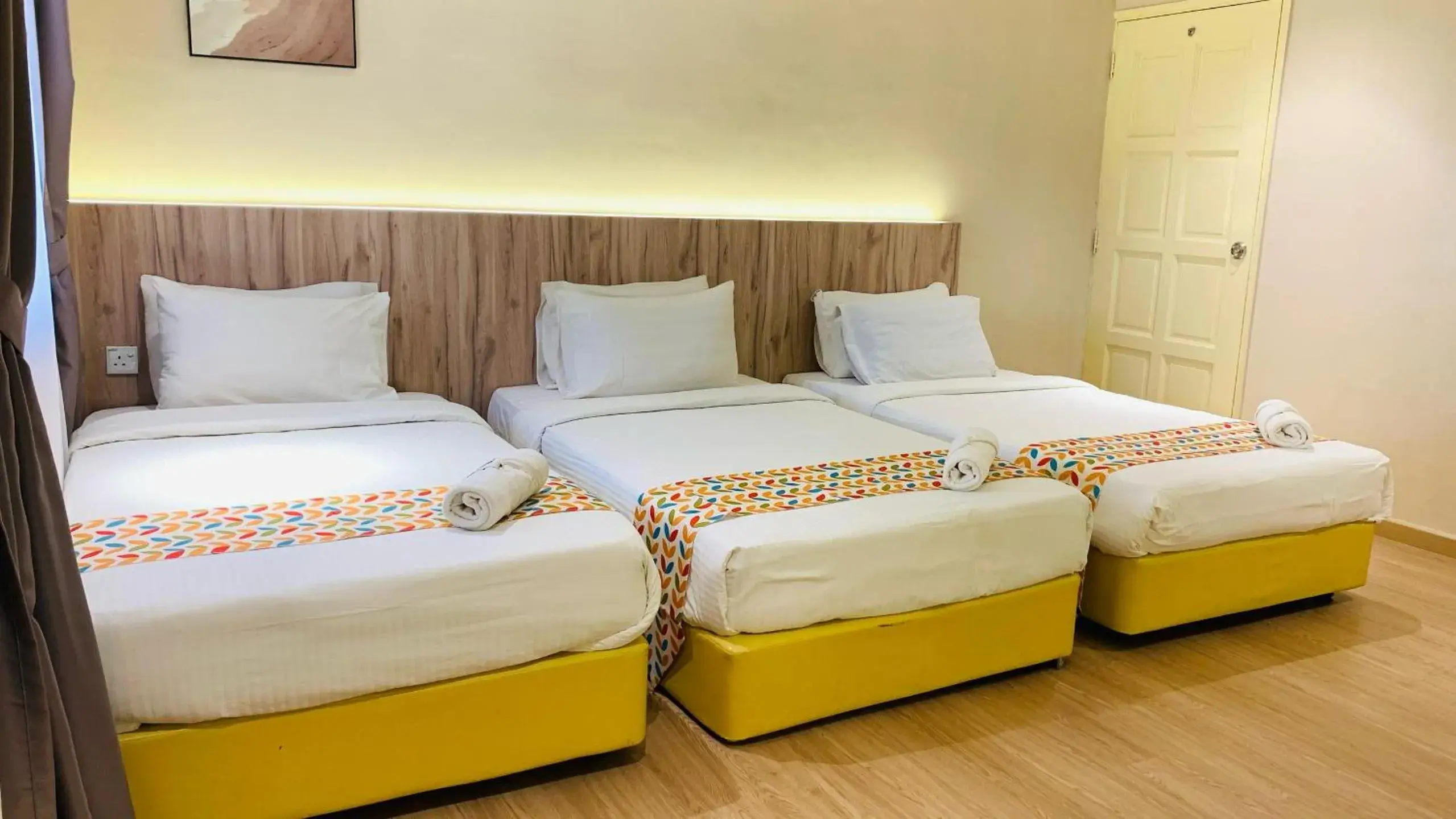 Triple Room in Rompin Beach Resorts Triple Room in Rompin Beach Resorts