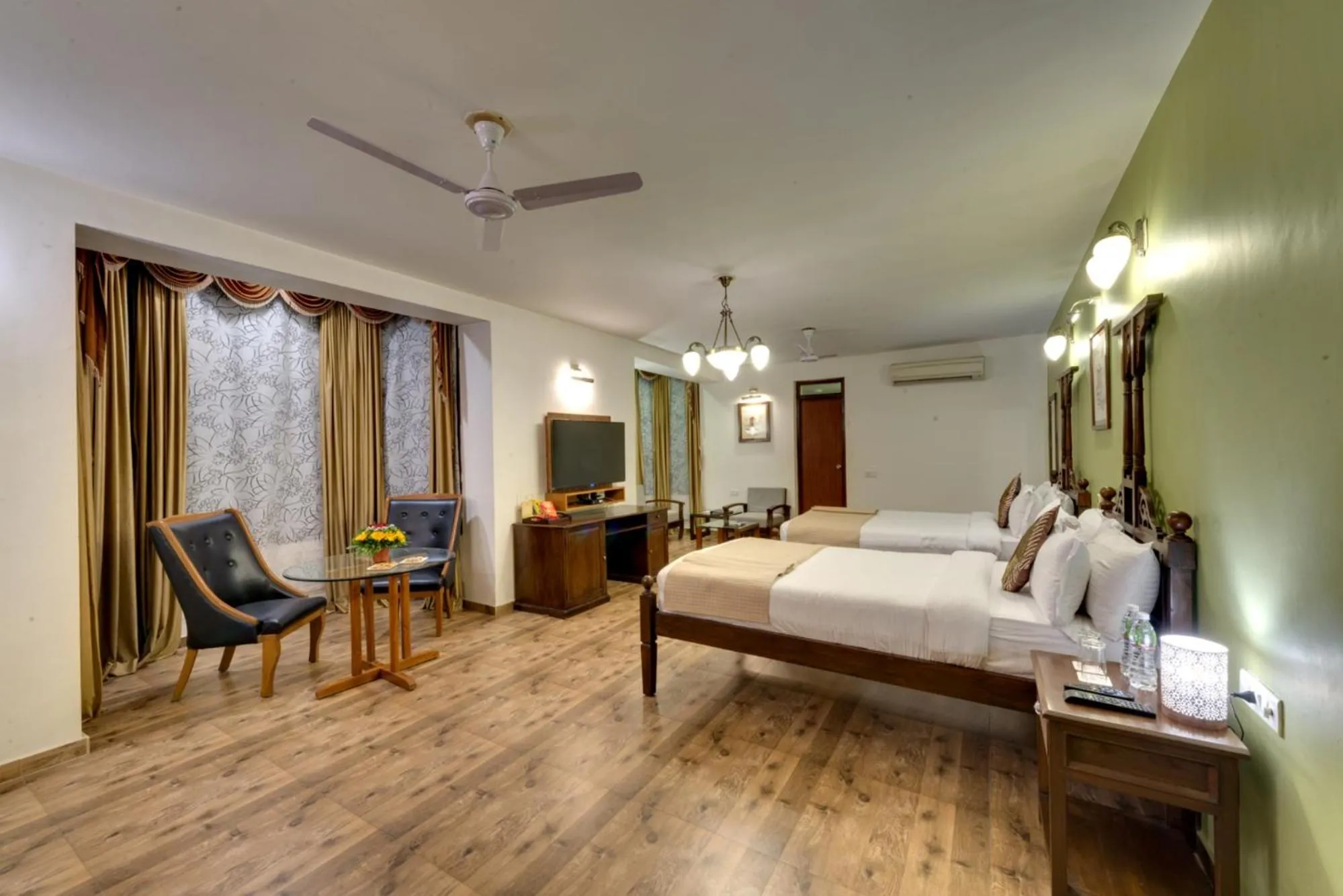 Bed in WelcomHeritage Mani Mansion