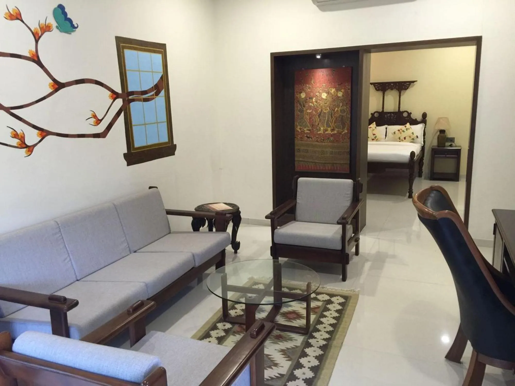 Bed in WelcomHeritage Mani Mansion