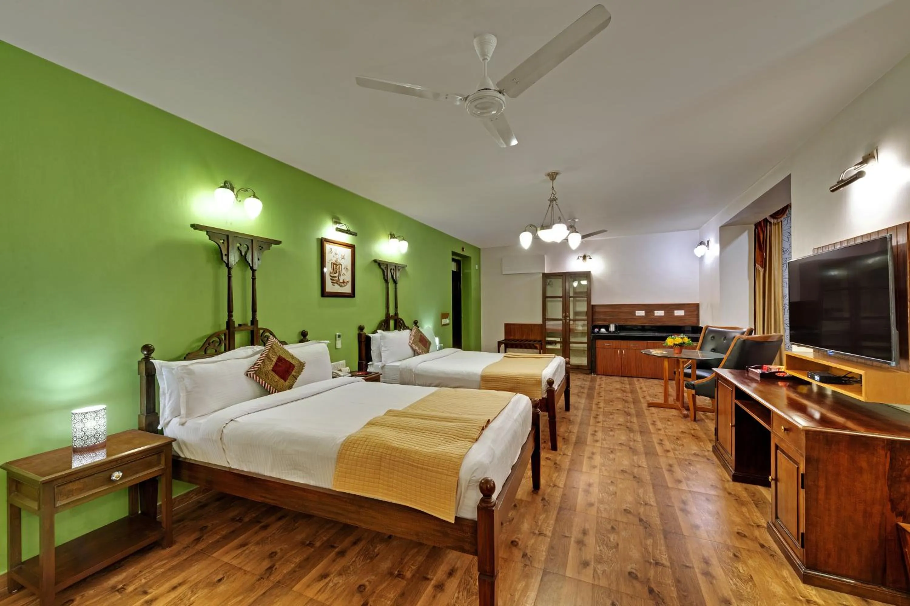 Bed in WelcomHeritage Mani Mansion