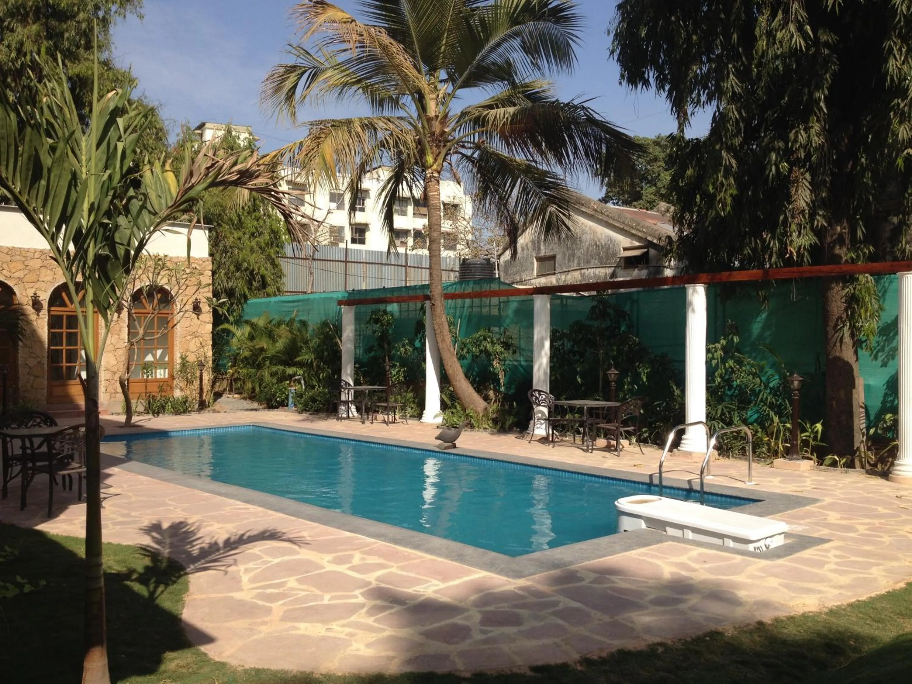 Swimming pool in WelcomHeritage Mani Mansion