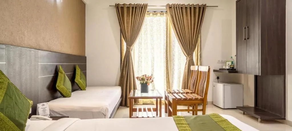 Bed in Pushpak Resort