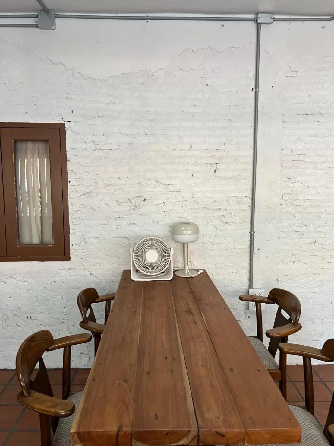 Seating area in Siam Breeze Inn by SPI