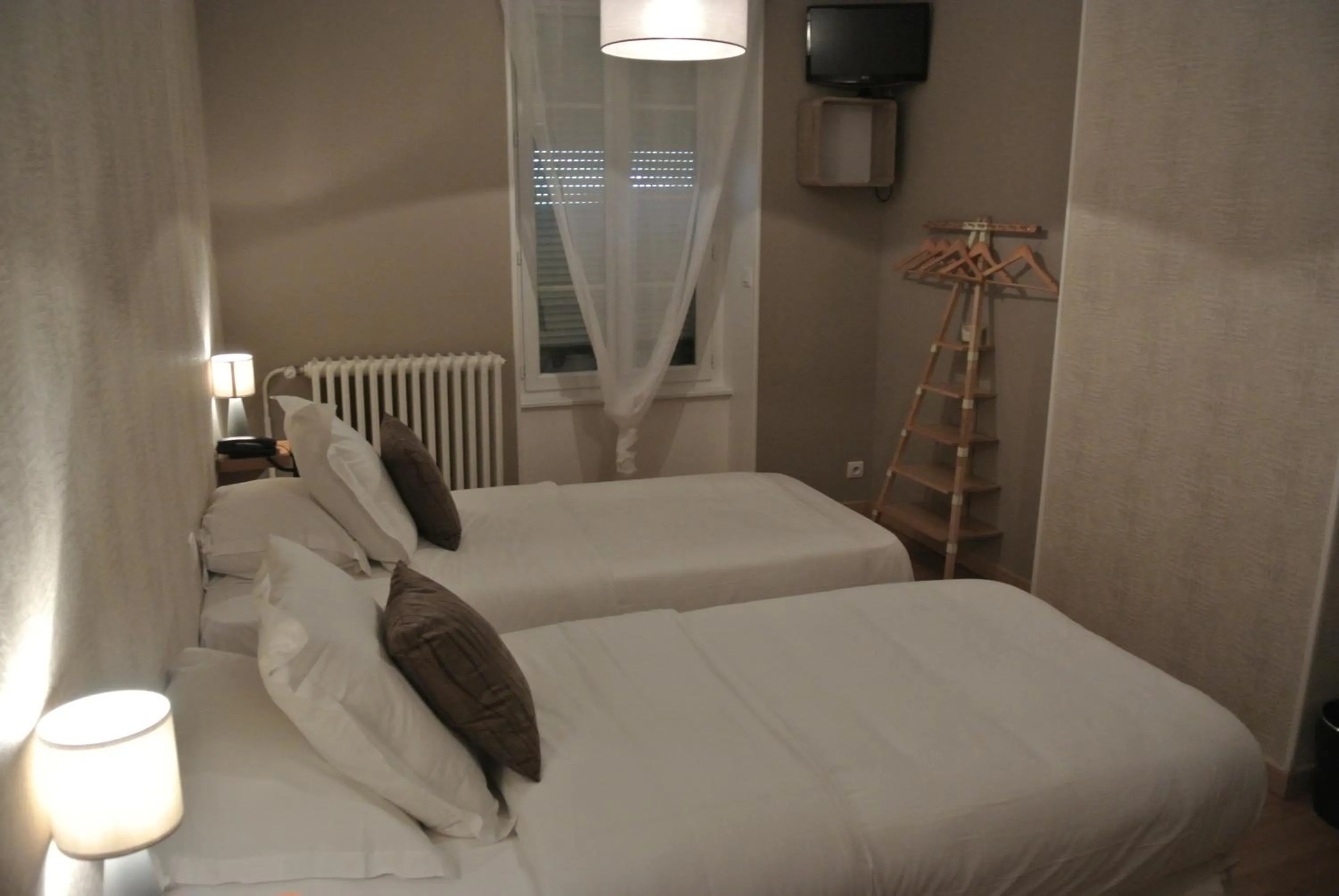 Bed in Hotel Le Central