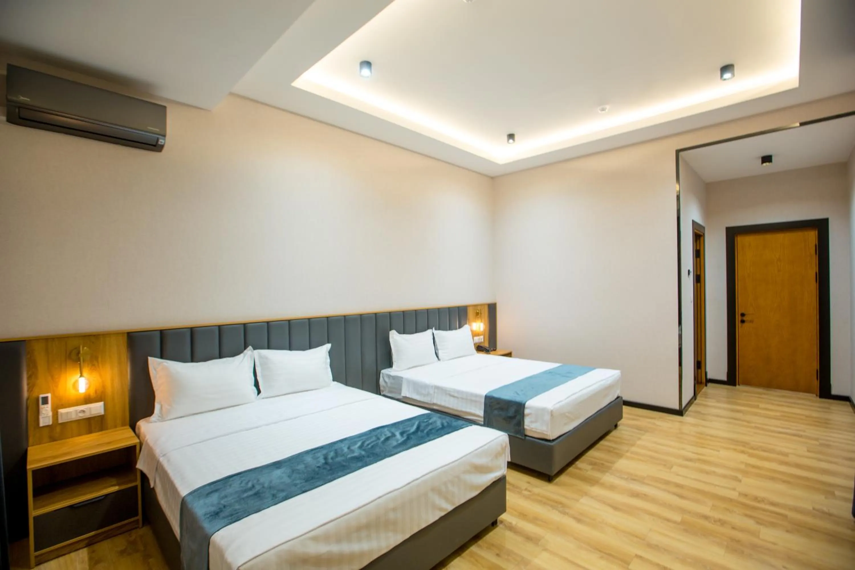 Dining area, Bed in Ajwa Plaza Premium Hotel