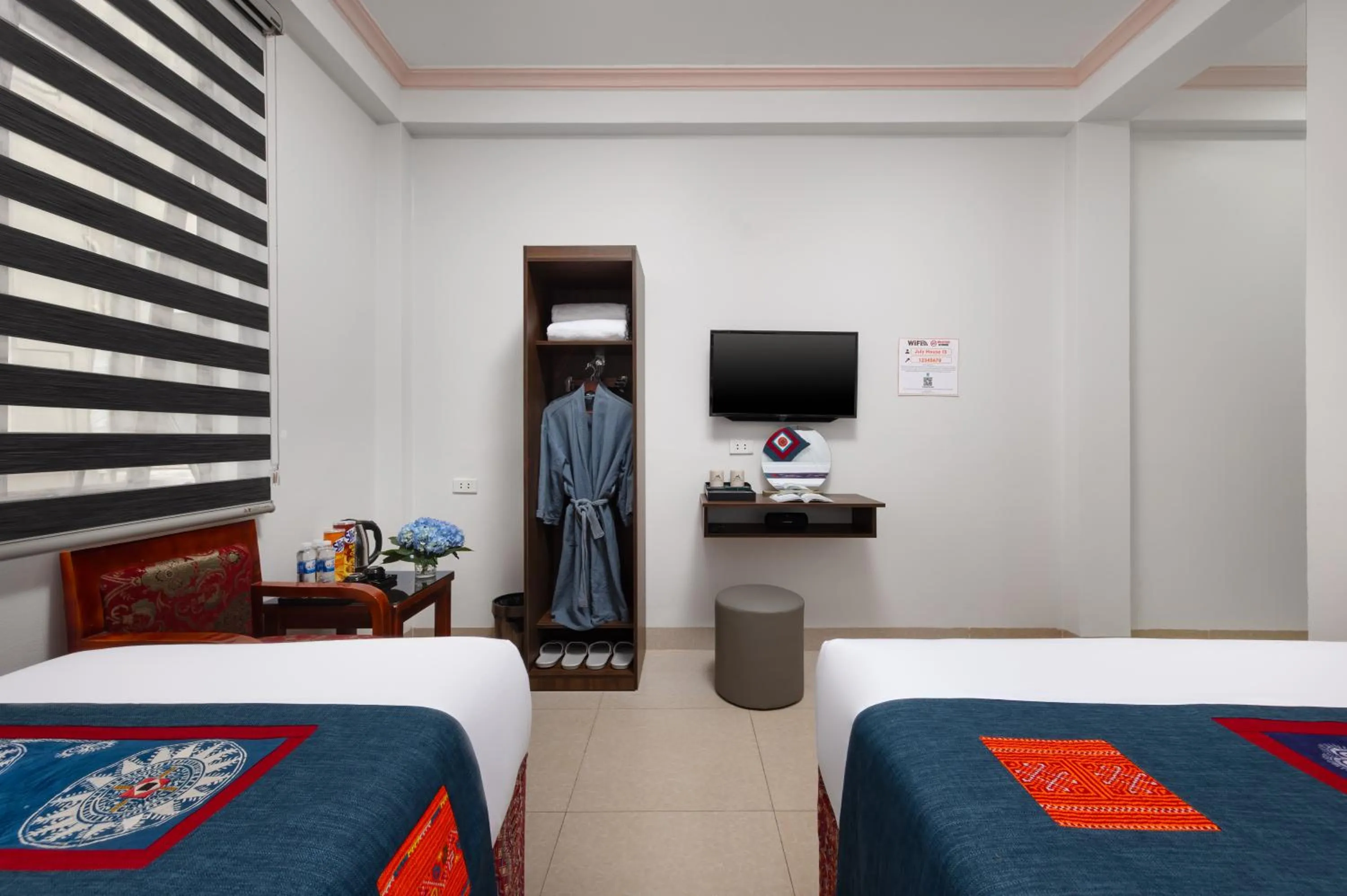 Communal lounge/ TV room, Bed in July House Central Sapa