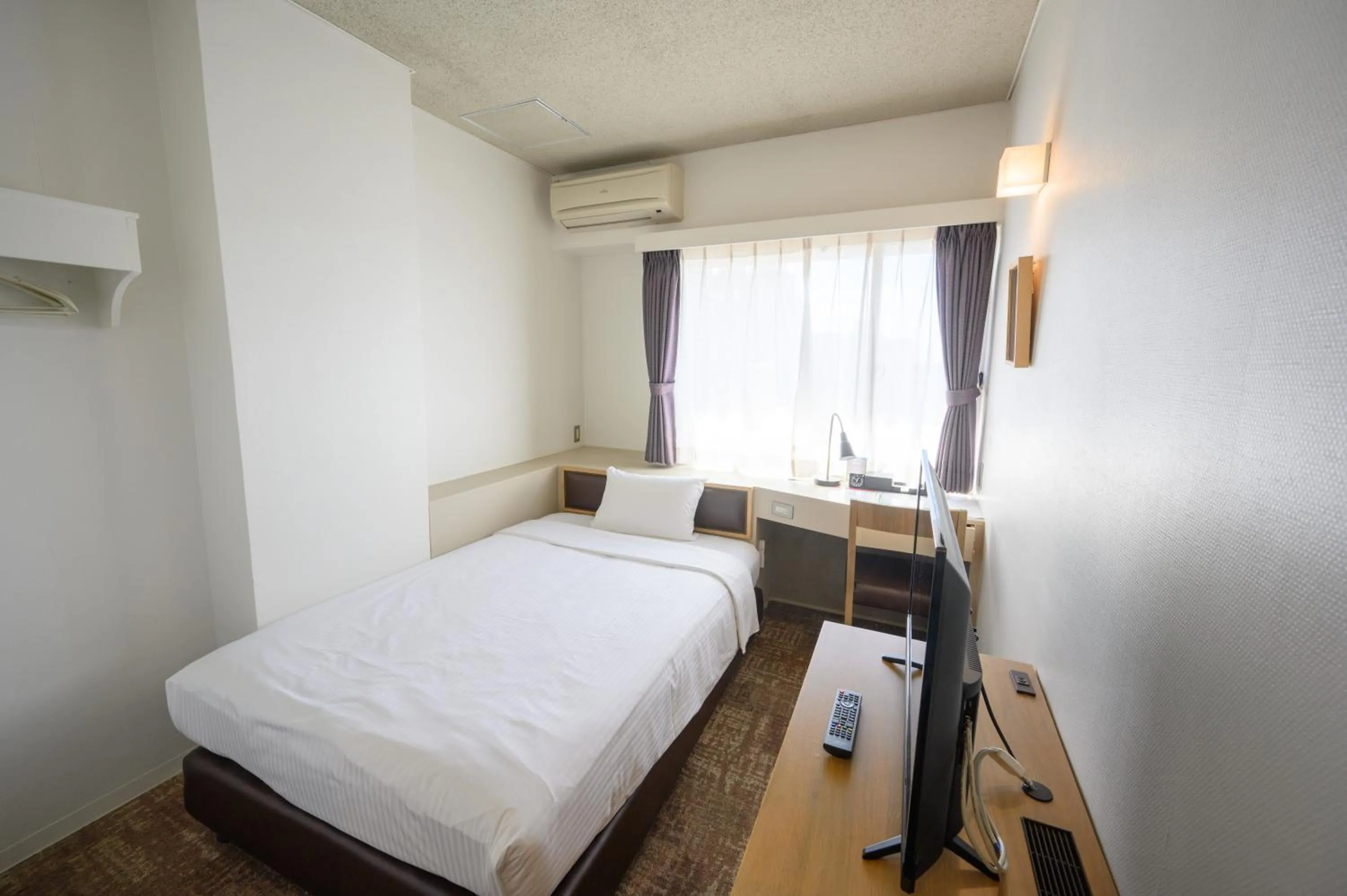 Photo of the whole room, Bed in Hotel Emerald Isle Ishigakijima