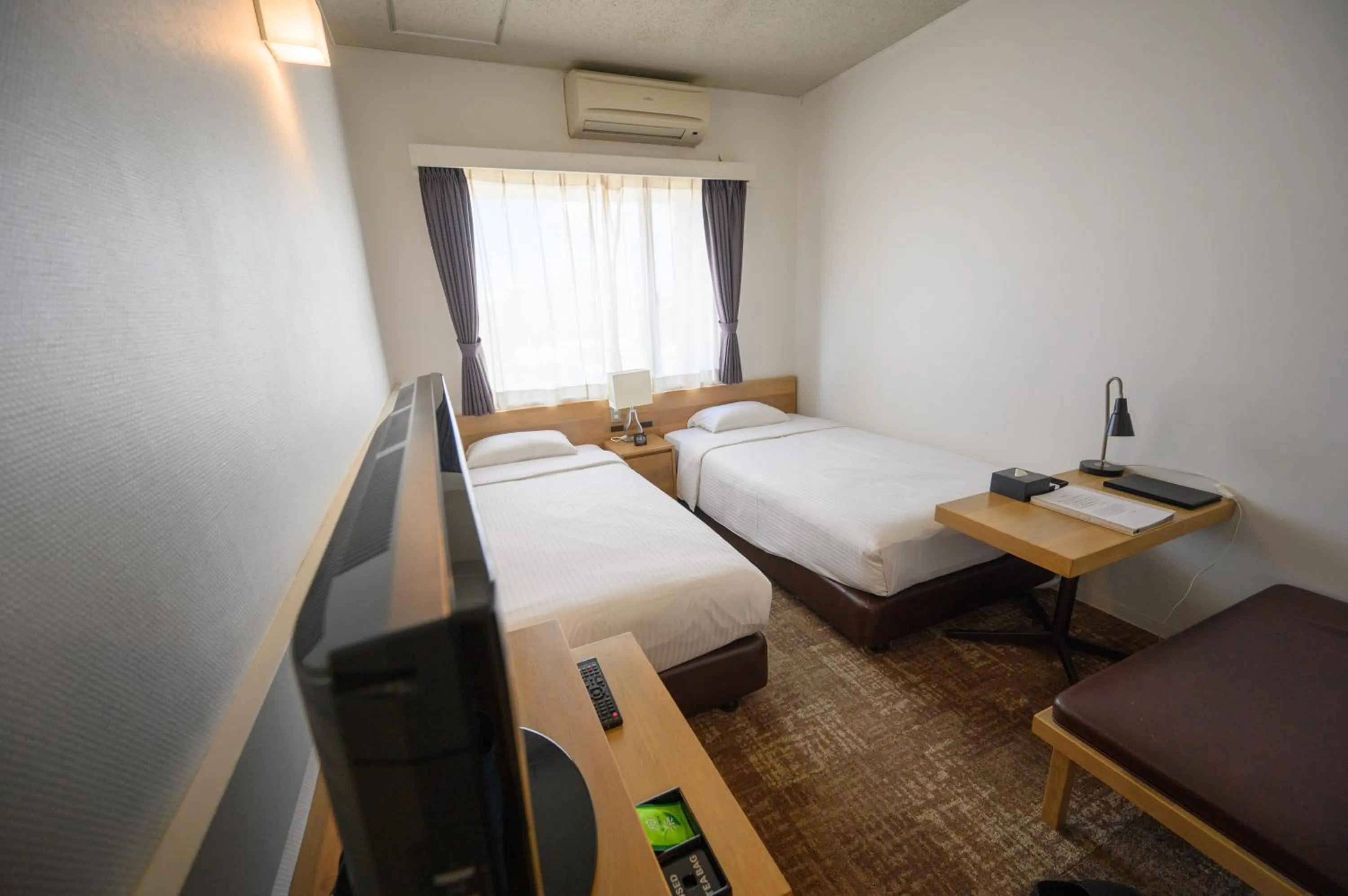 Photo of the whole room, Bed in Hotel Emerald Isle Ishigakijima